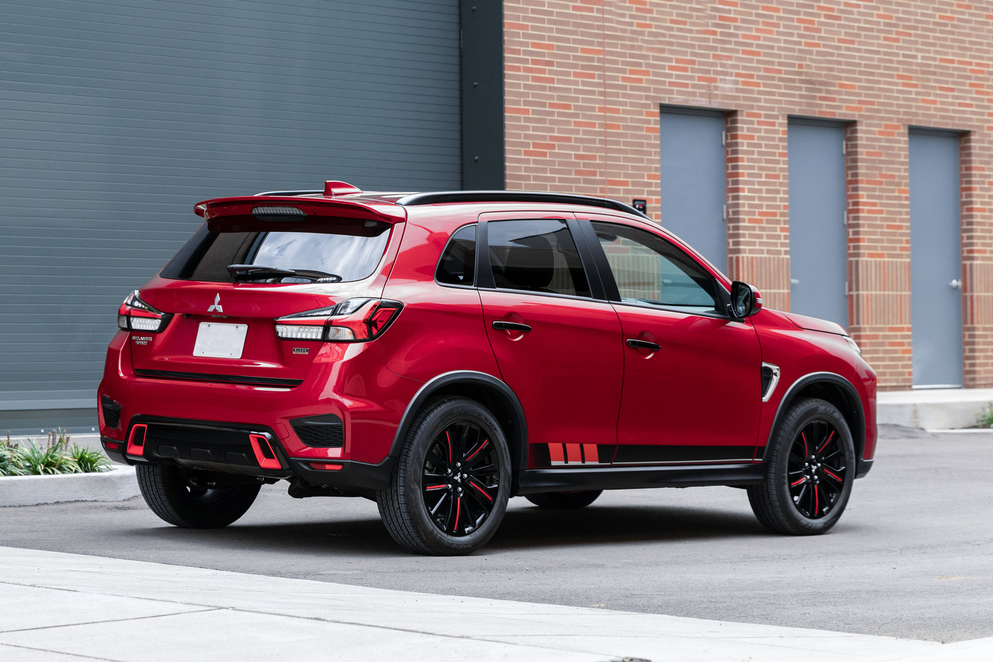 Rear of a red 2024 Mitsubishi Outlander Sport