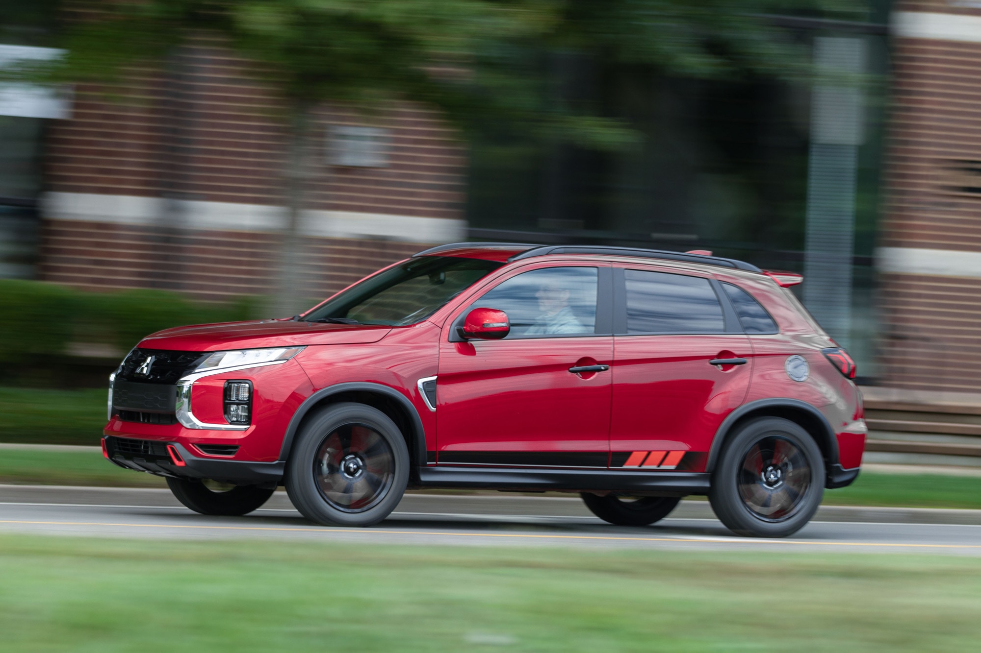 FSide of a red 2024 Mitsubishi Outlander Sport