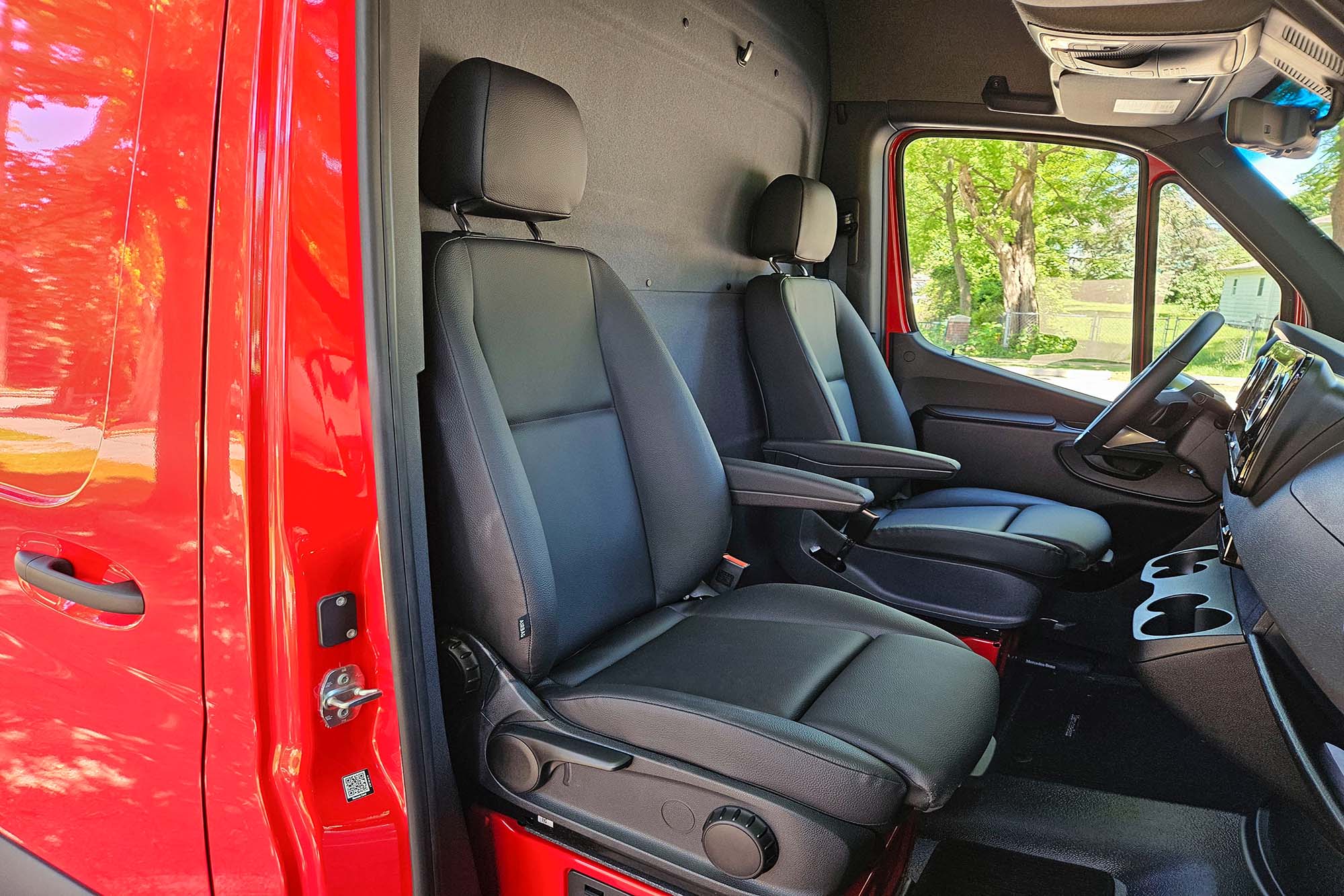 The front passenger seats of a 2024 Mercedes-Benz eSprinter