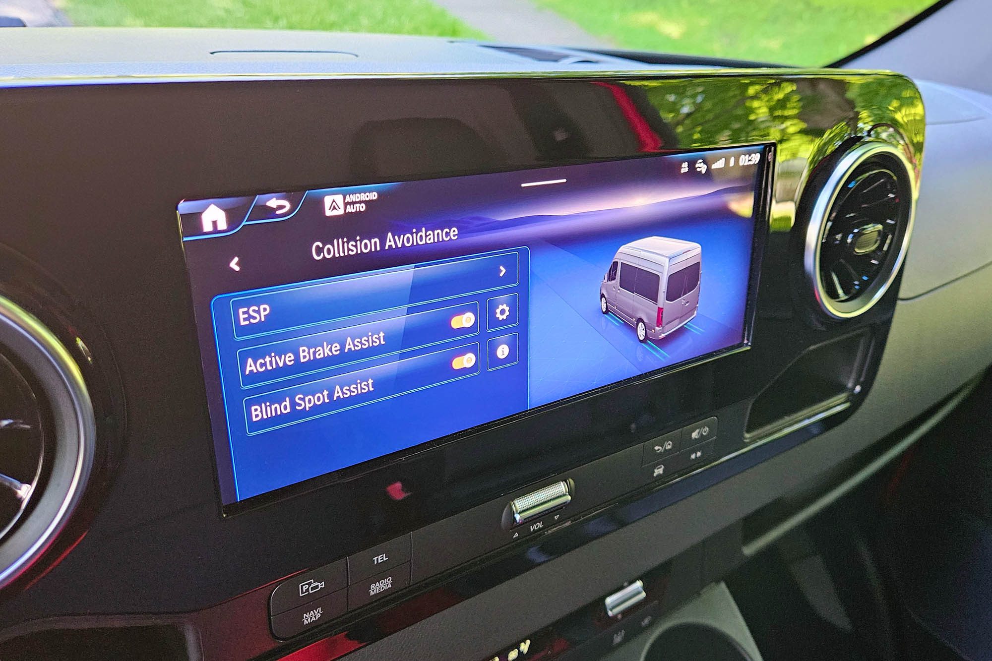 The MBUX infotainment display screen showing the safety features of a 2024 Mercedes-Benz eSprinter