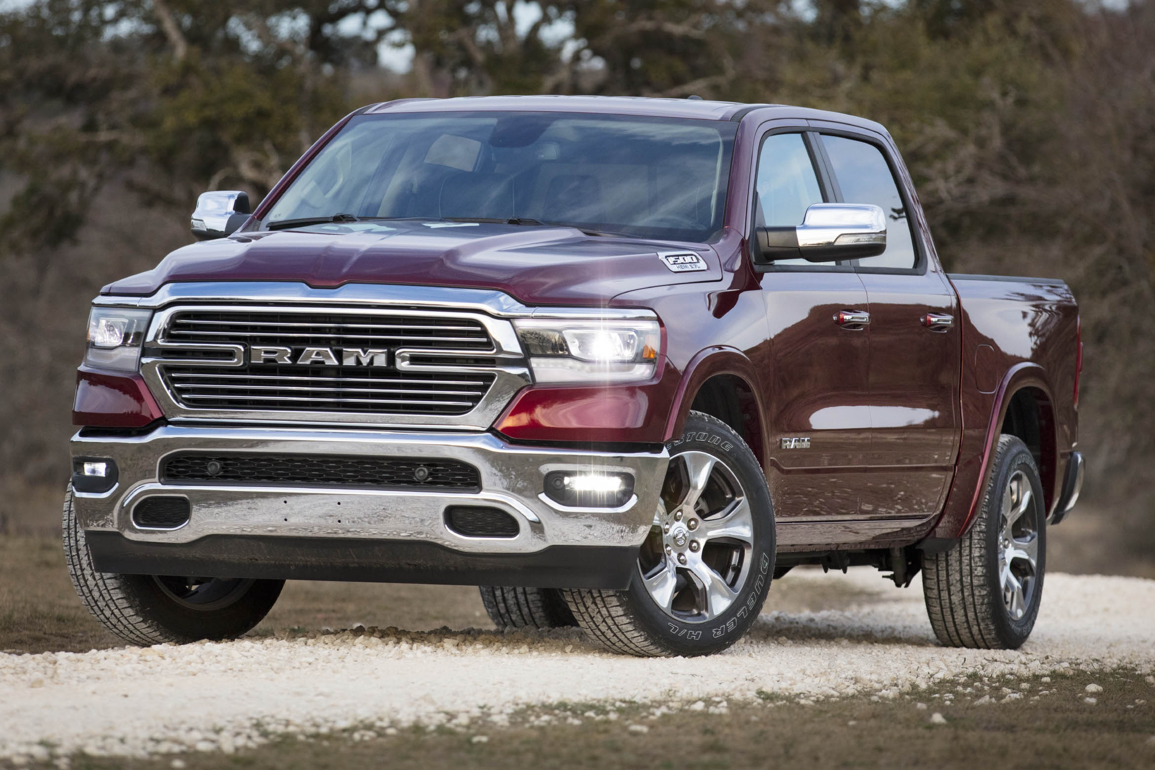 Front left quarter view of a red 2024 Ram 1500 Laramie