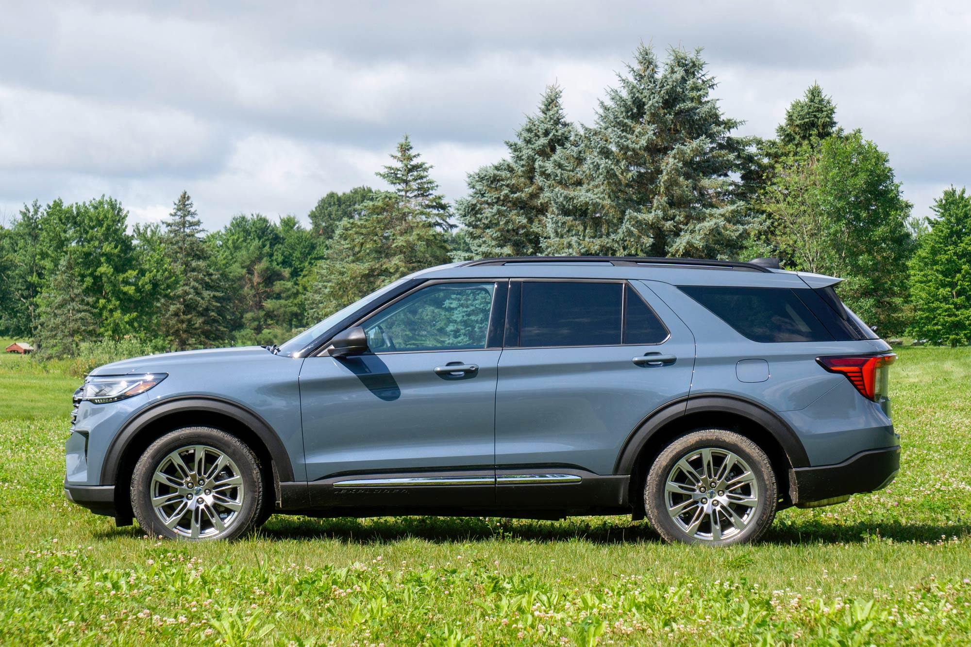 Side of a Vapor Blue 2025 Ford Explorer Active