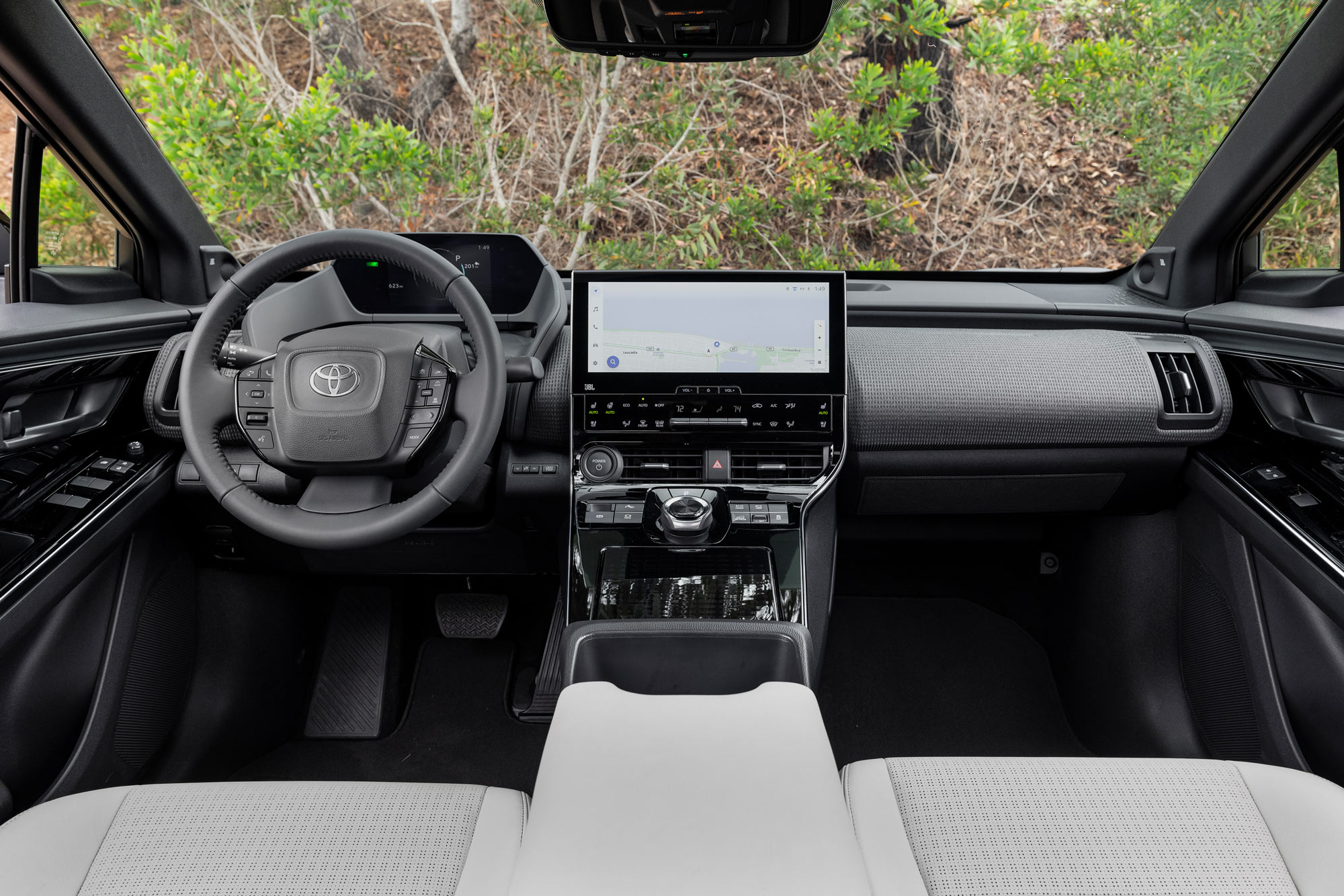 Steering wheel and dashboard in a 2024 Toyota bZ4x