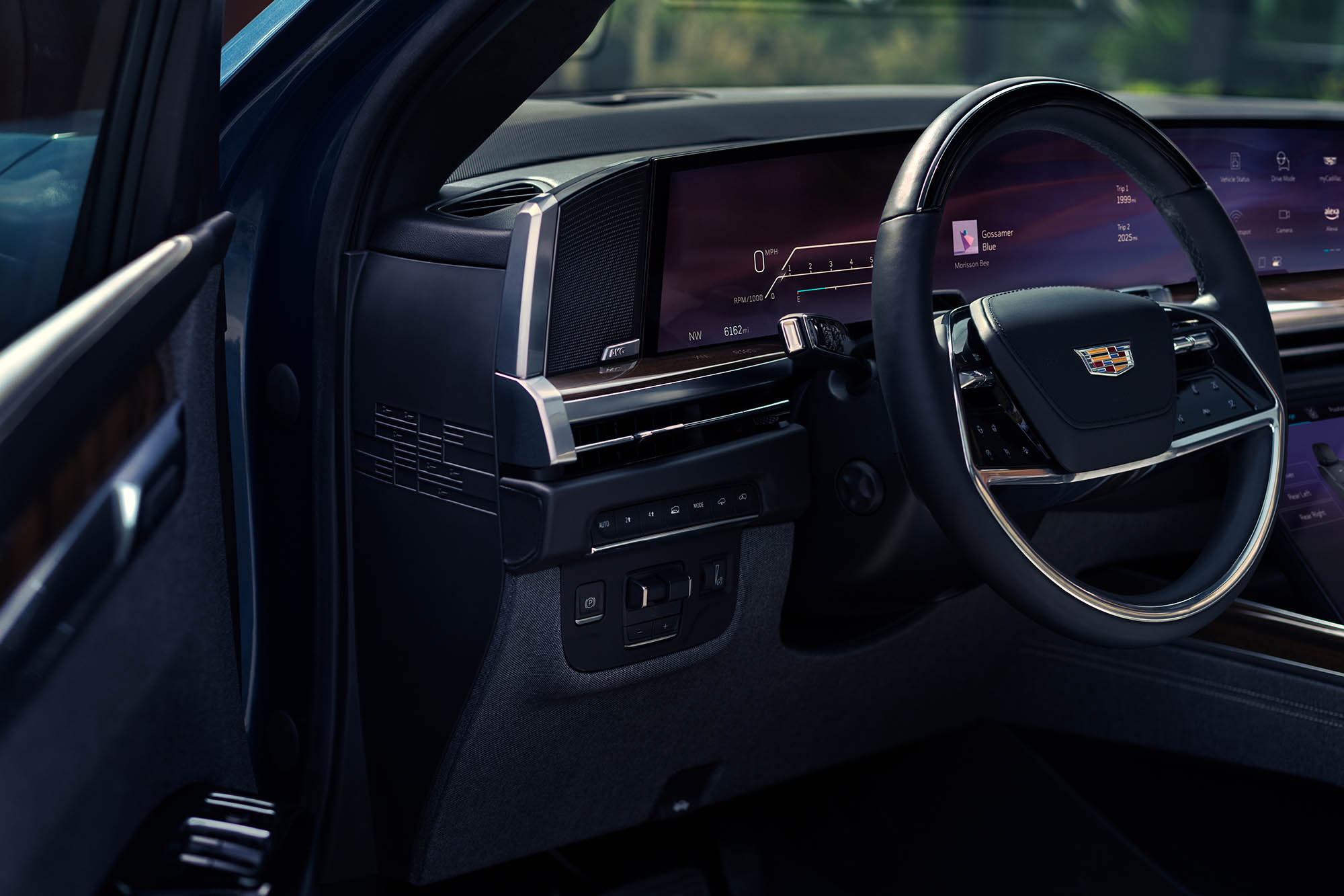 The steering wheel and gauge cluster of a 2025 Cadillac Escalade