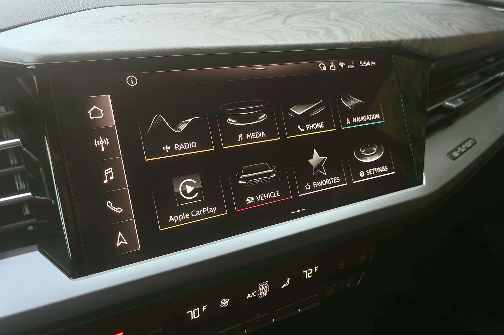 View of a 2024 Audi Q4 55 e-tron interior showing the infotainment system home screen.