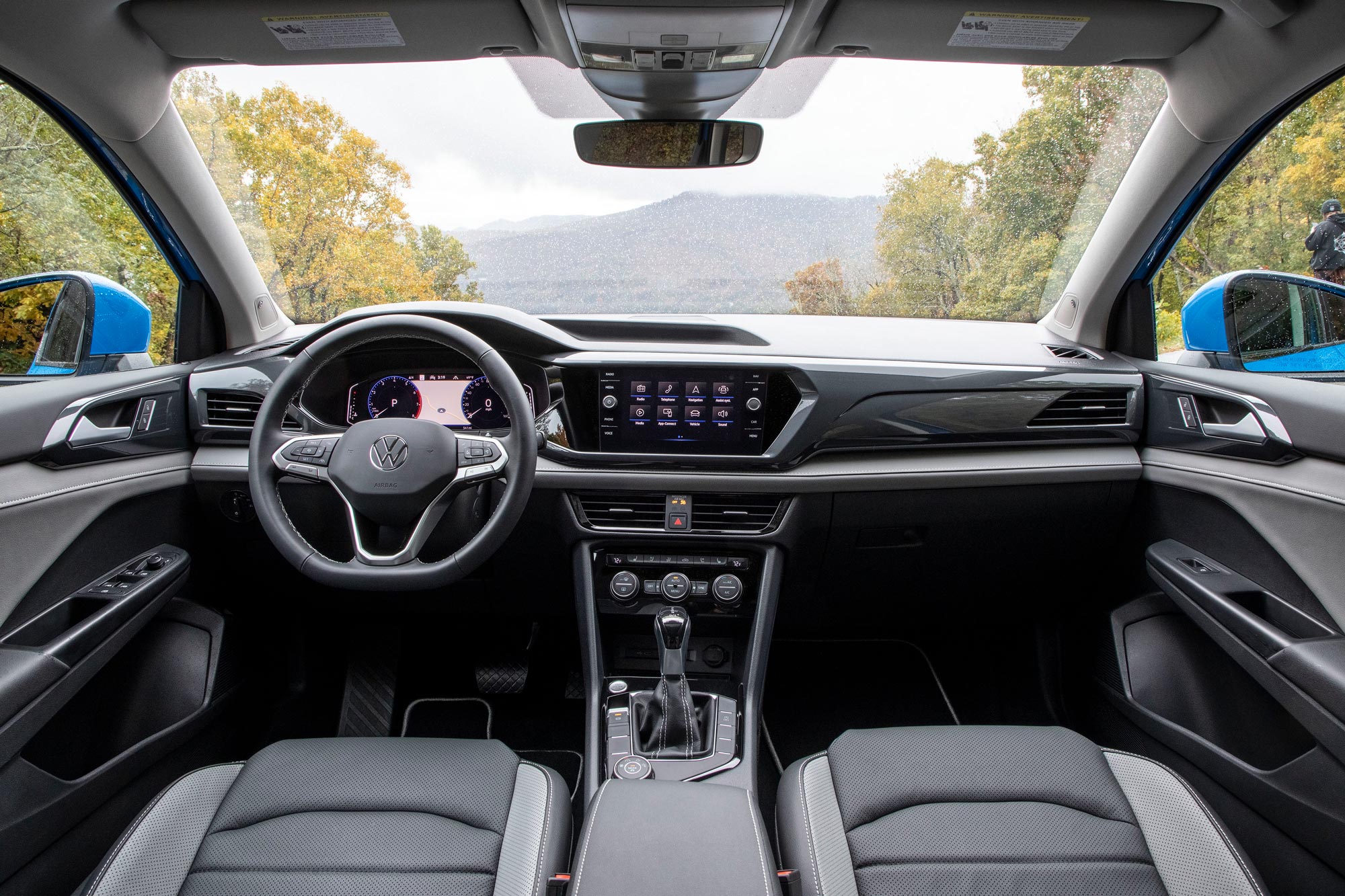 2024 Volkswagen Taos interior and infotainment screen.