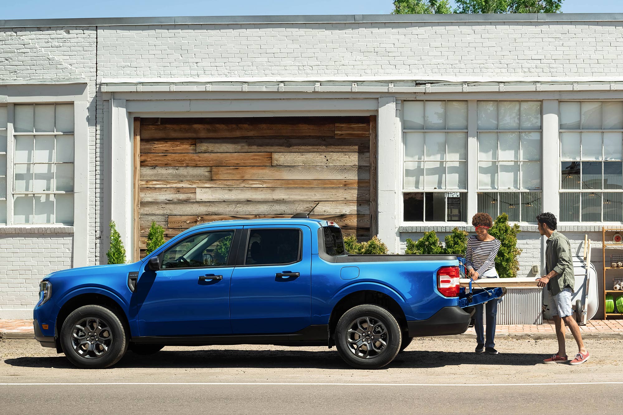 Side of a blue 2025 Ford Maverick XLT