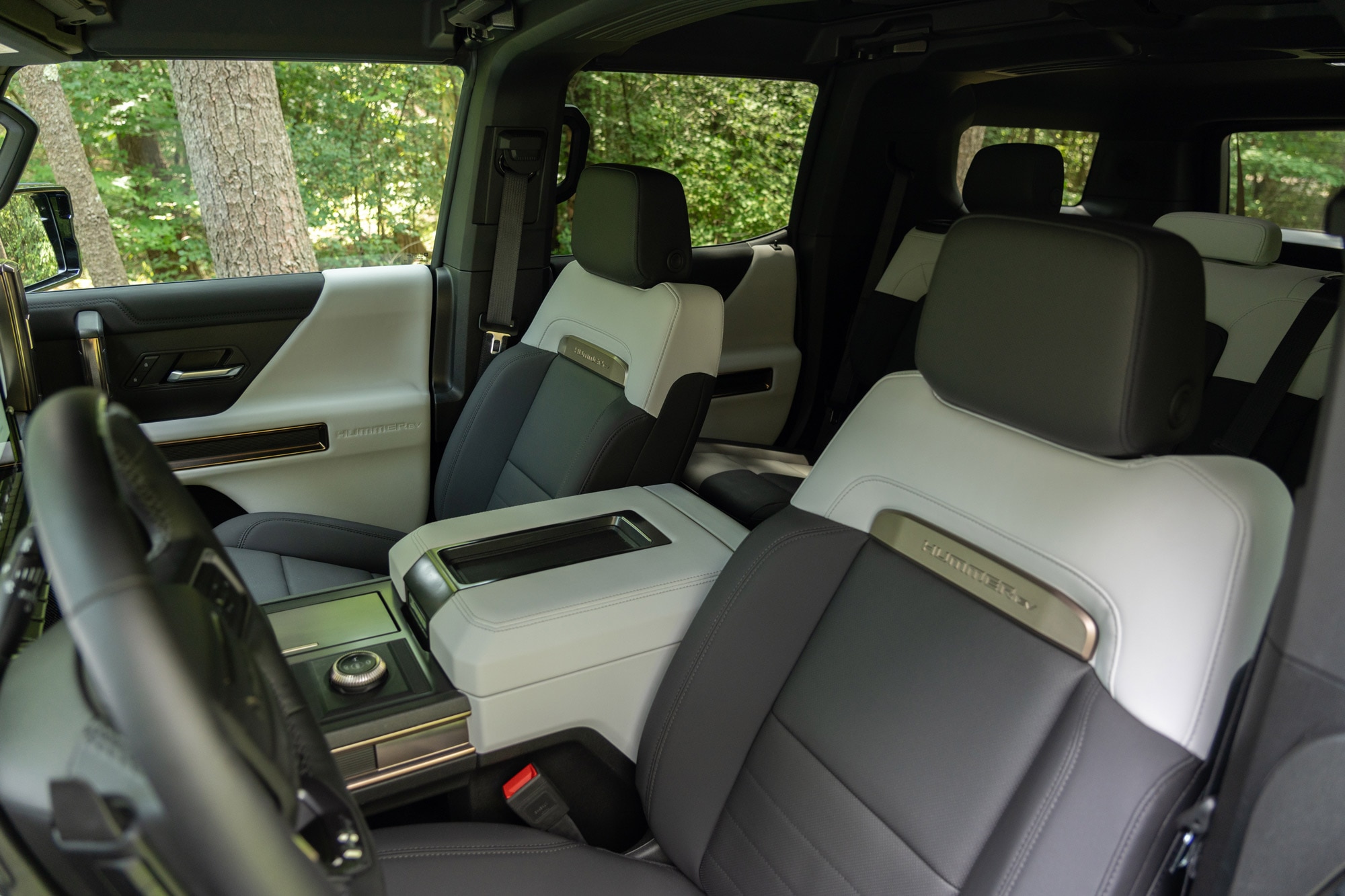 2024 GMC Hummer EV SUV interior showing the front seats