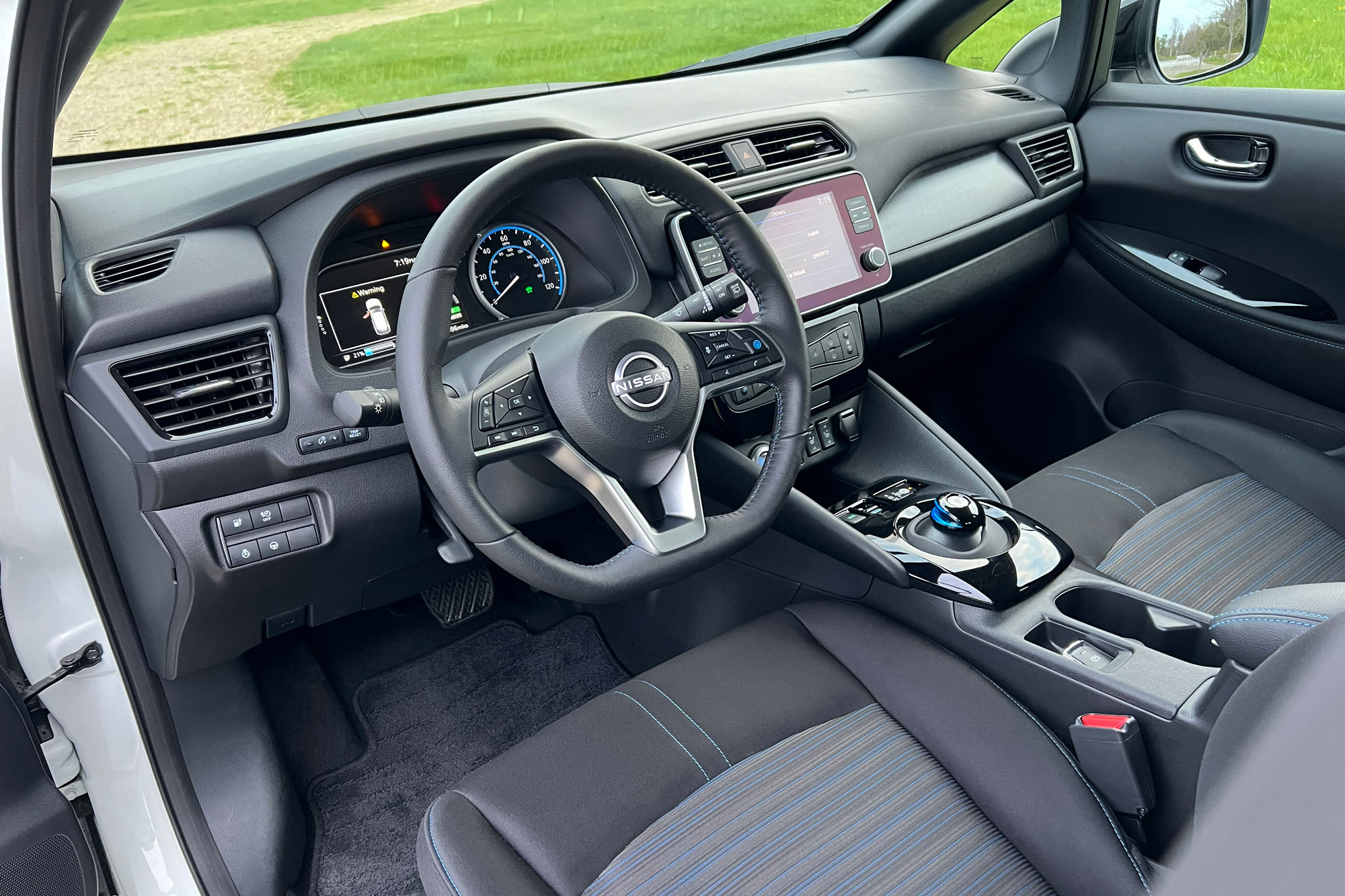 2024 Nissan Leaf SV Plus interior showing the dashboard and front seats