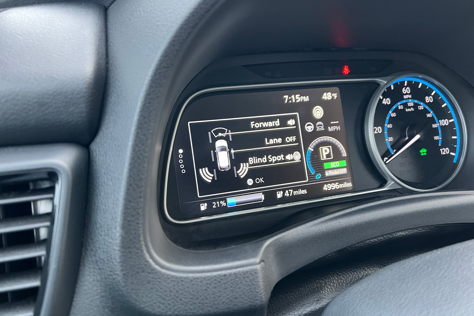 2024 Nissan Leaf SV Plus interior showing the safety features menu in the gauge cluster