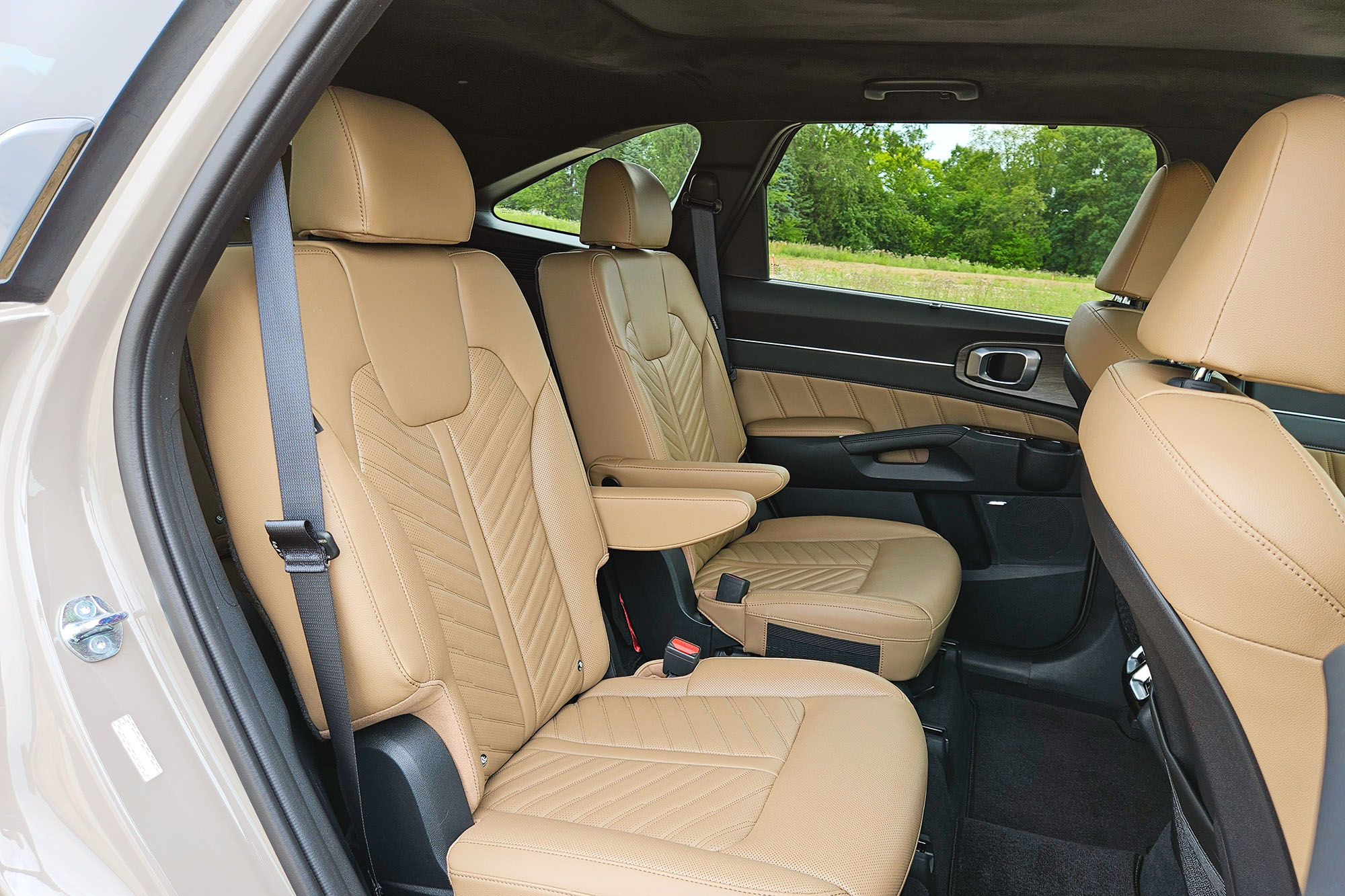 View of a 2024 Kia Sorento SX Prestige X-Pro interior showing the Olive Brown second-row seats.