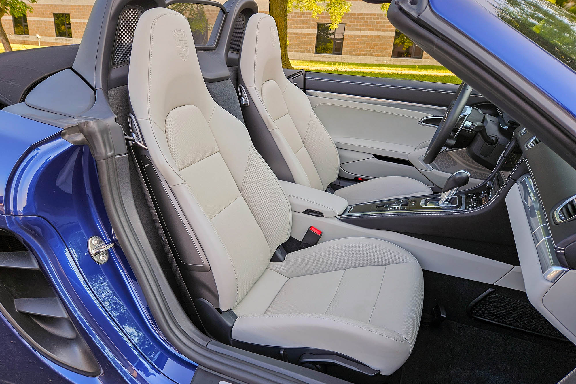 View of a 2024 Porsche 718 Boxster Style Edition interior showing the front seats