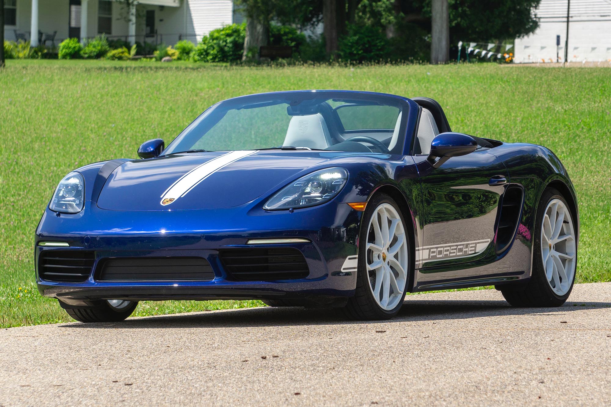 Front-quarter view of a blue 2024 Porsche 718 Boxster Style Edition