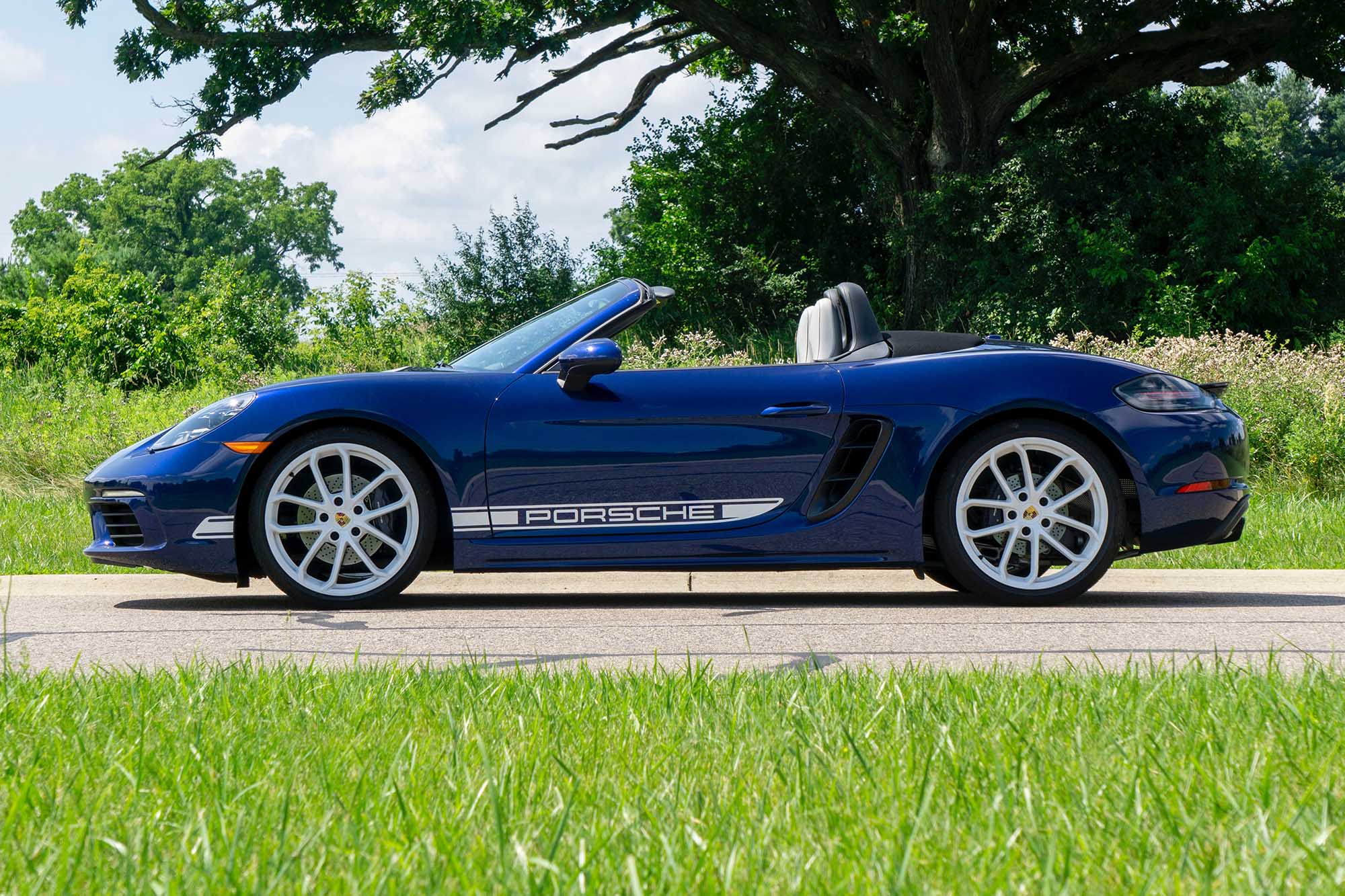 Side view of a blue 2024 Porsche 718 Boxster Style Edition