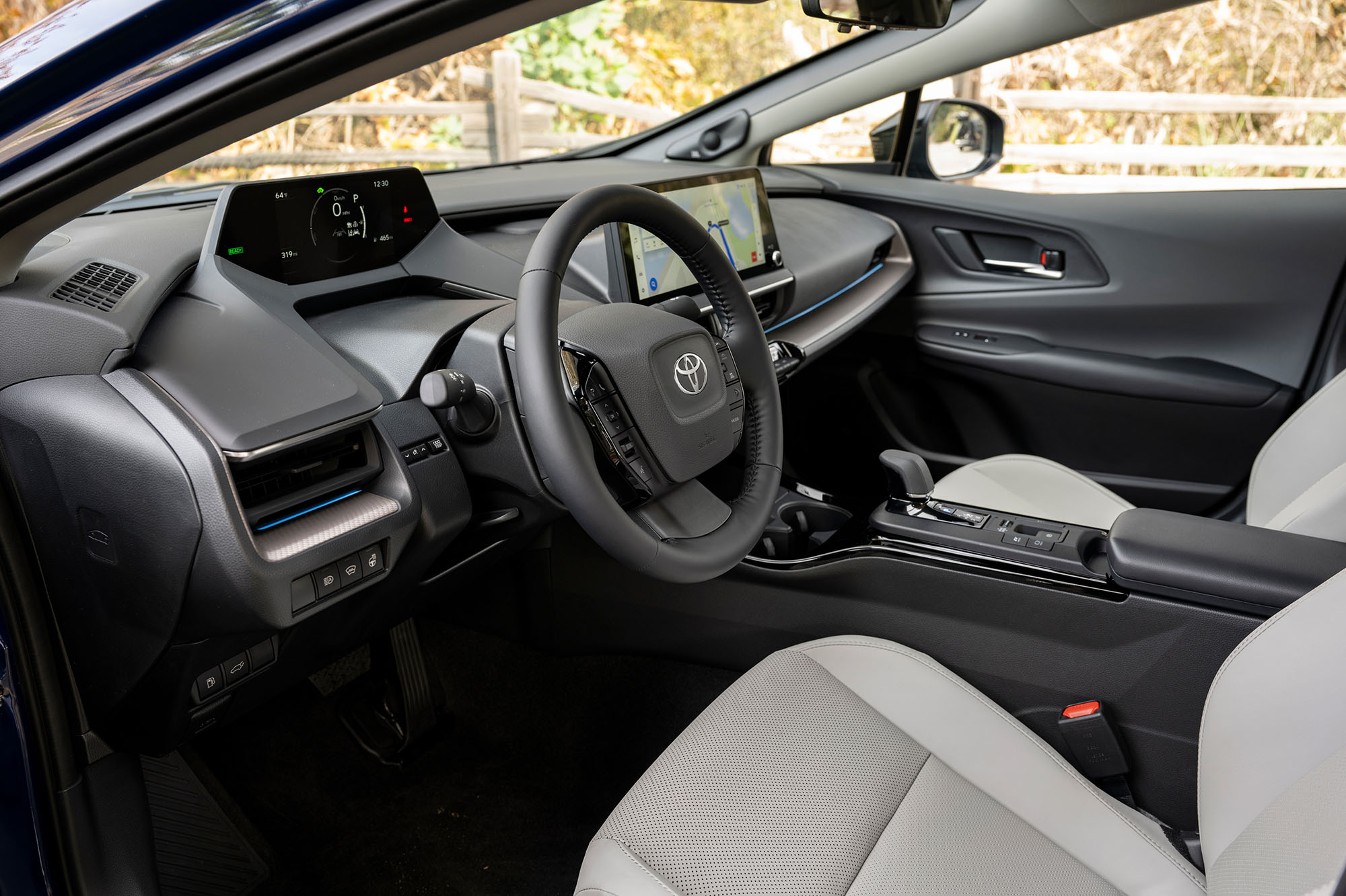 Front interior seating in a Toyota Prius.