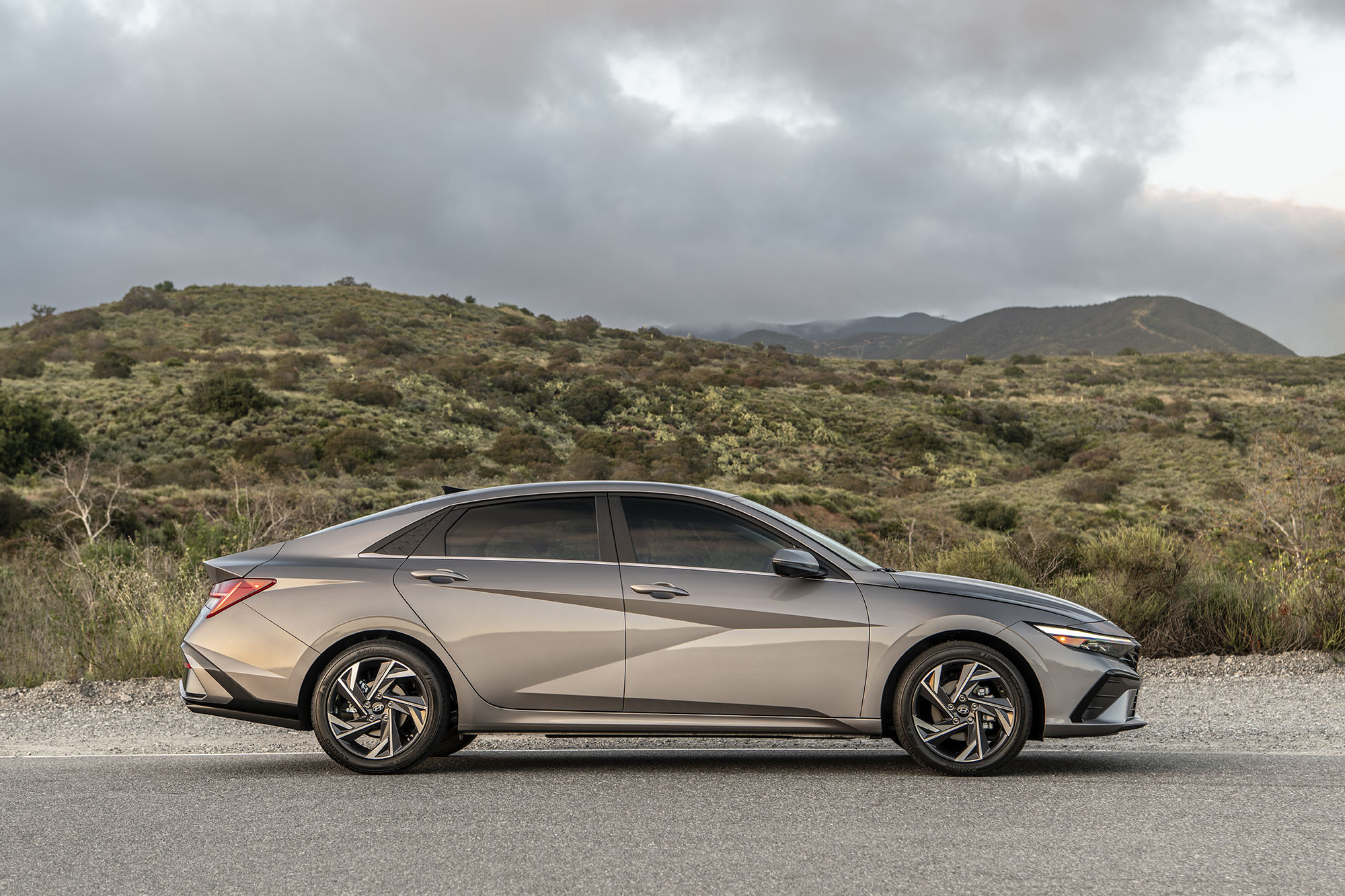 Profile view of a gray Hyundai Elantra Hybrid.