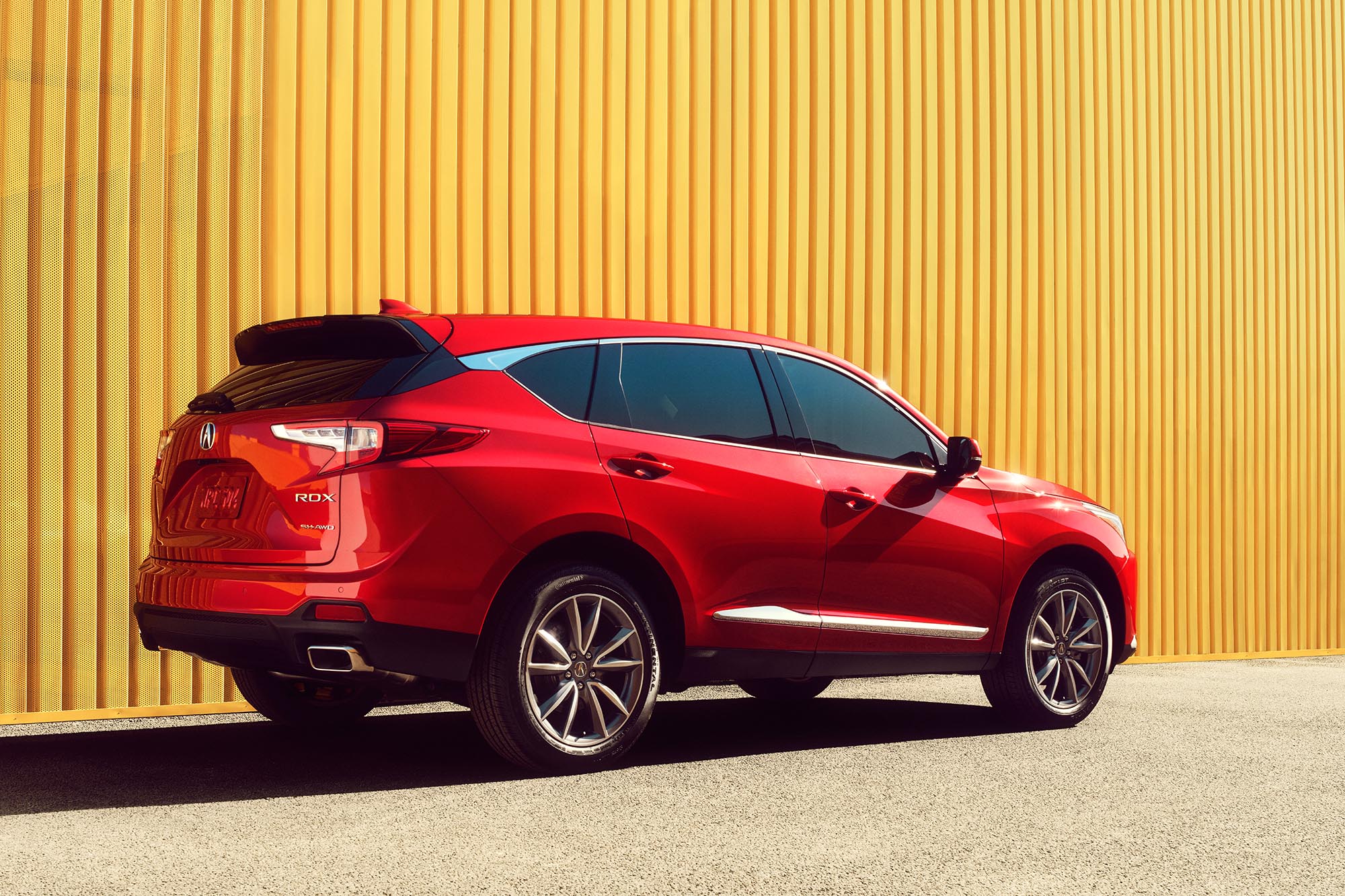 Acura RDX in red, rear