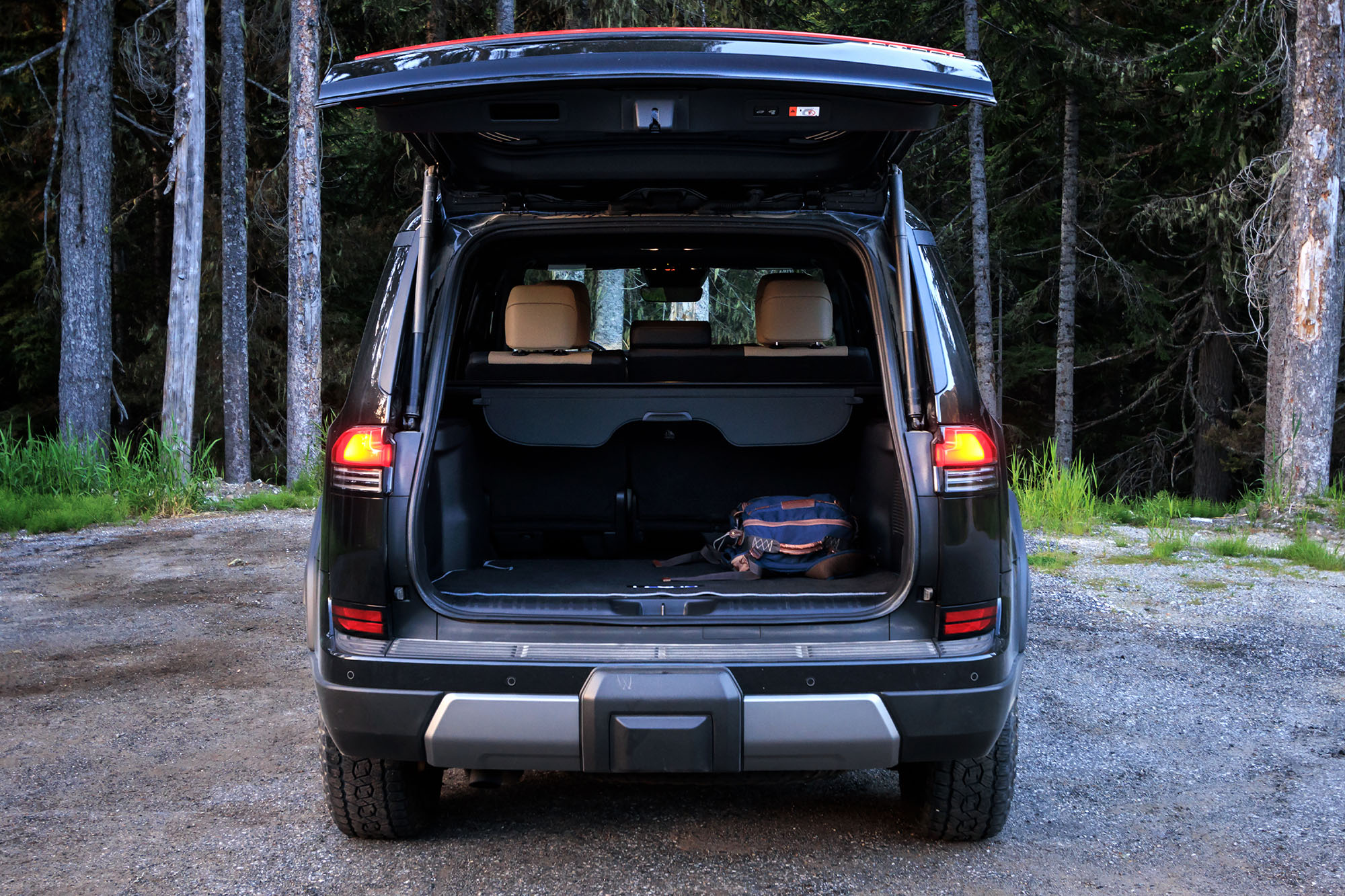 View of a 2024 Lexus GX Overtrail interior showing the cargo space behind the second-row seat.