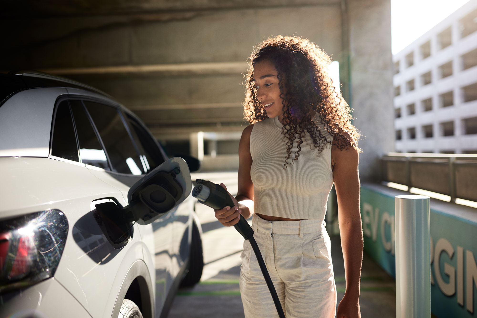 Person charges vehicle