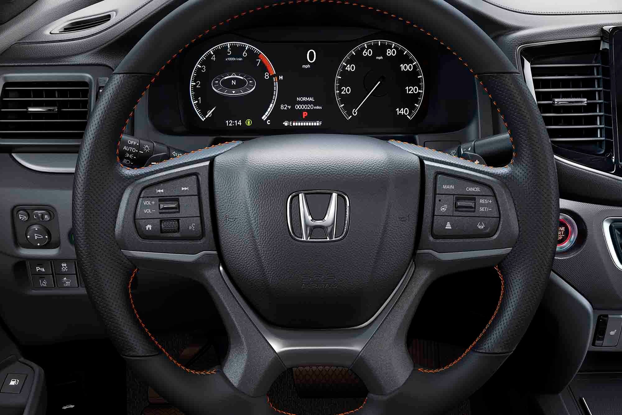 Steering wheel and instrument panel of a Honda Ridgeline.