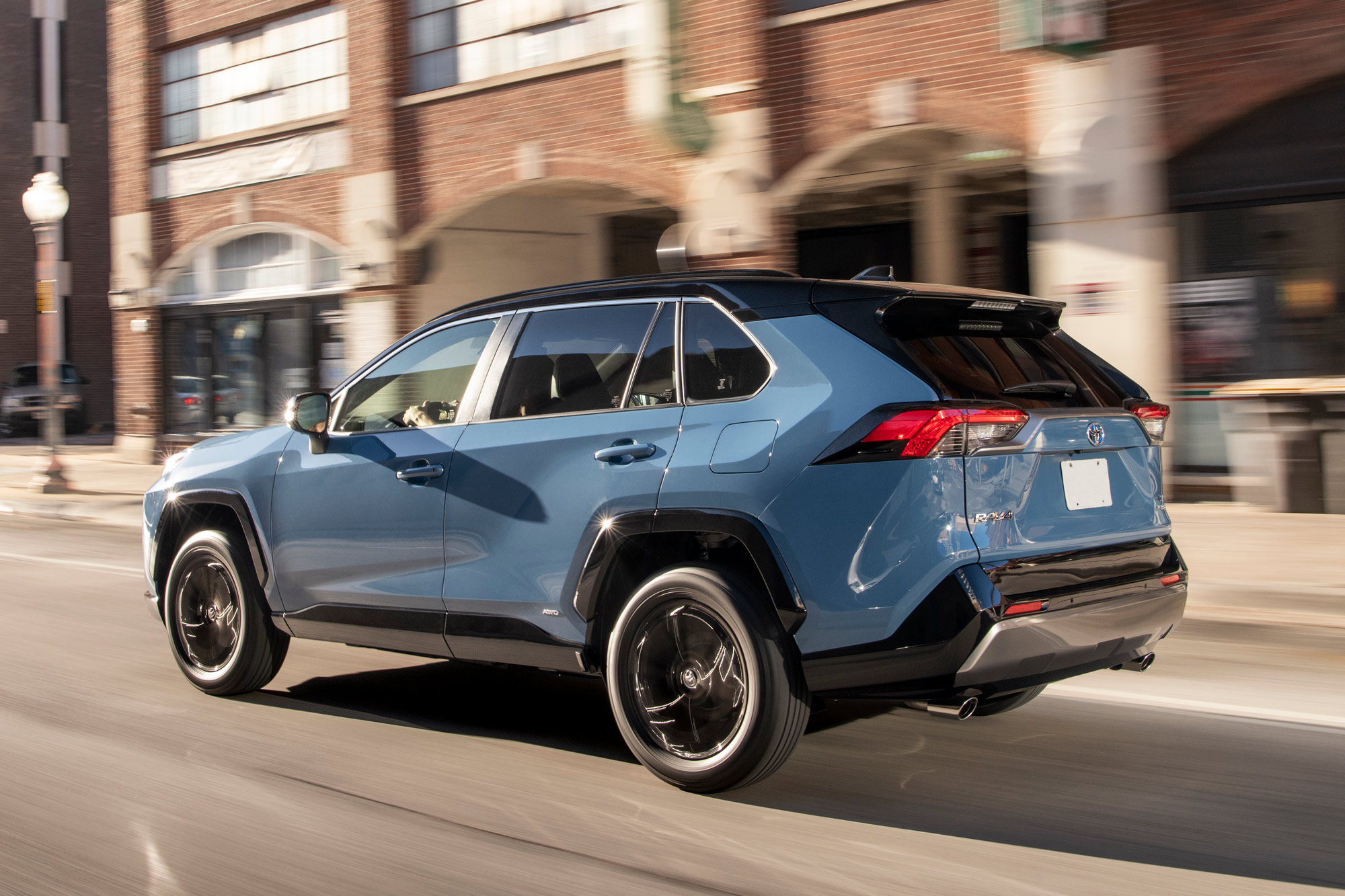 Side of a blue 2024 Toyota RAV4