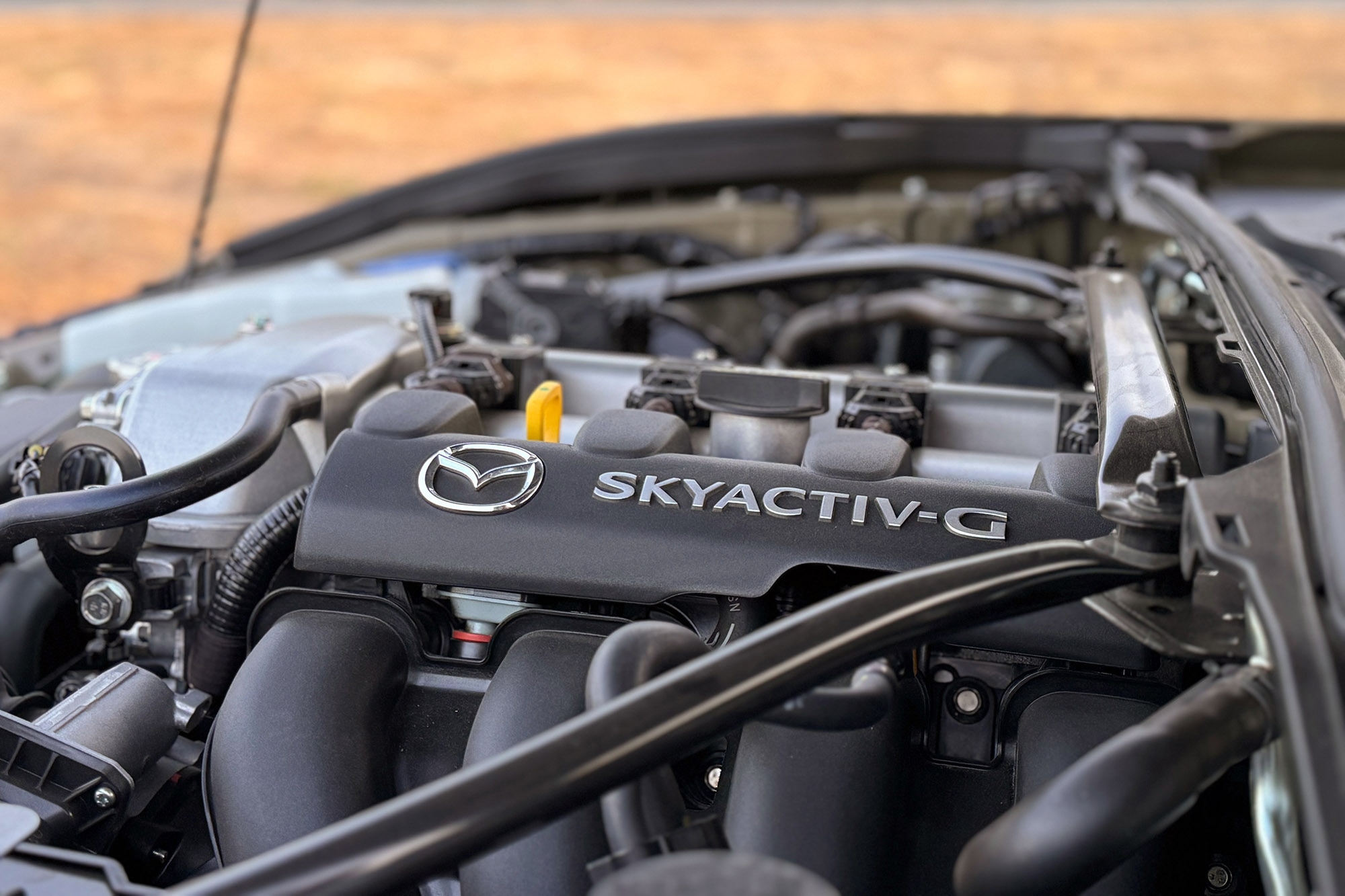 View of a 2024 Mazda MX-5 Miata engine.