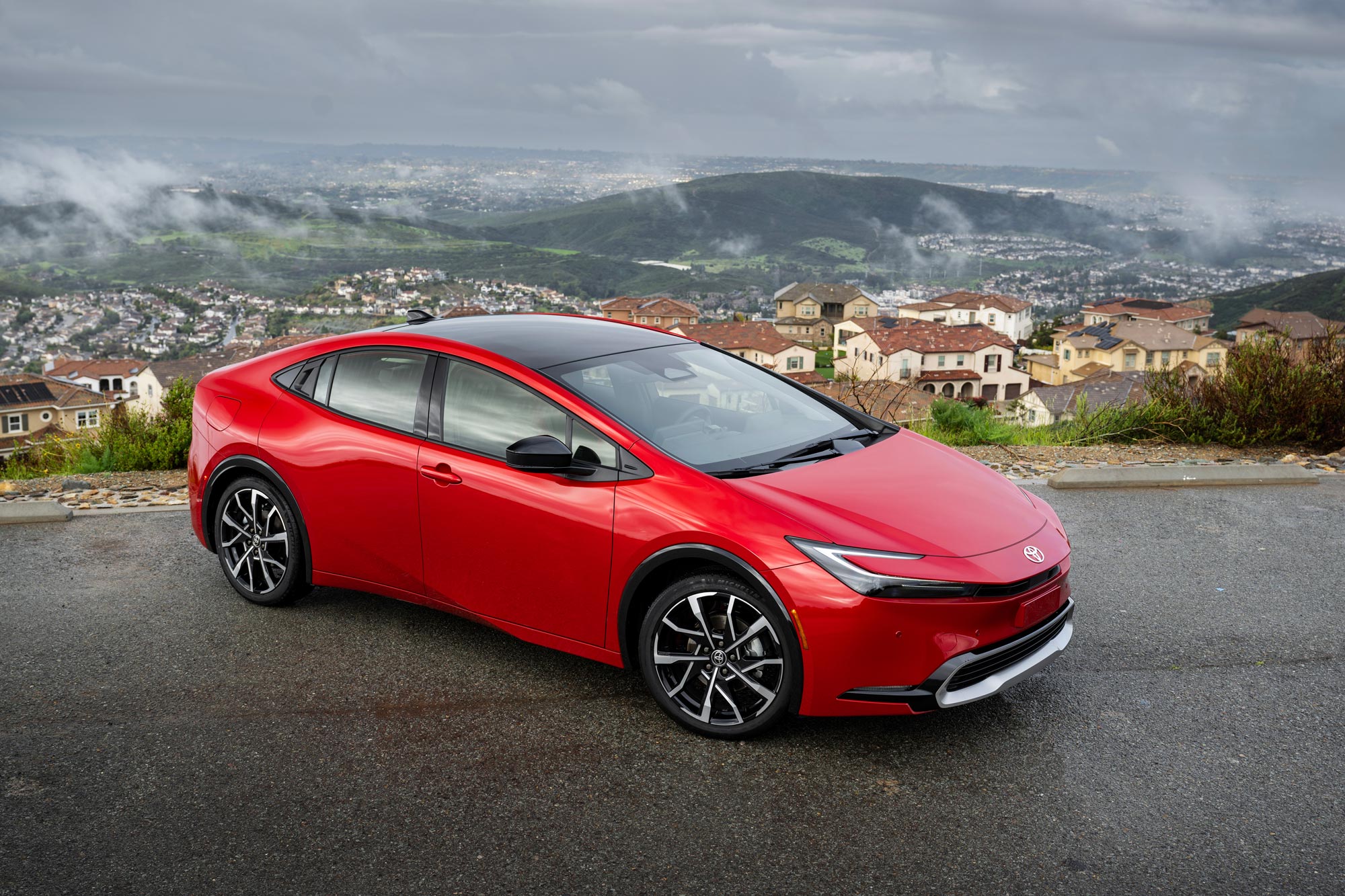 2024 Toyota Prius Prime parked overlooking the city.