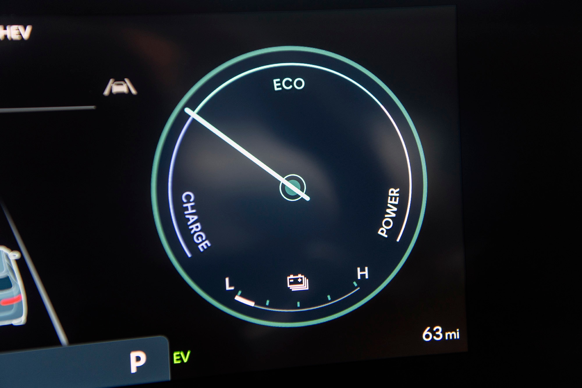 Dashboard indicator of hybrid battery charging in a Hyundai Tucson Plug-In Hybrid vehicle.