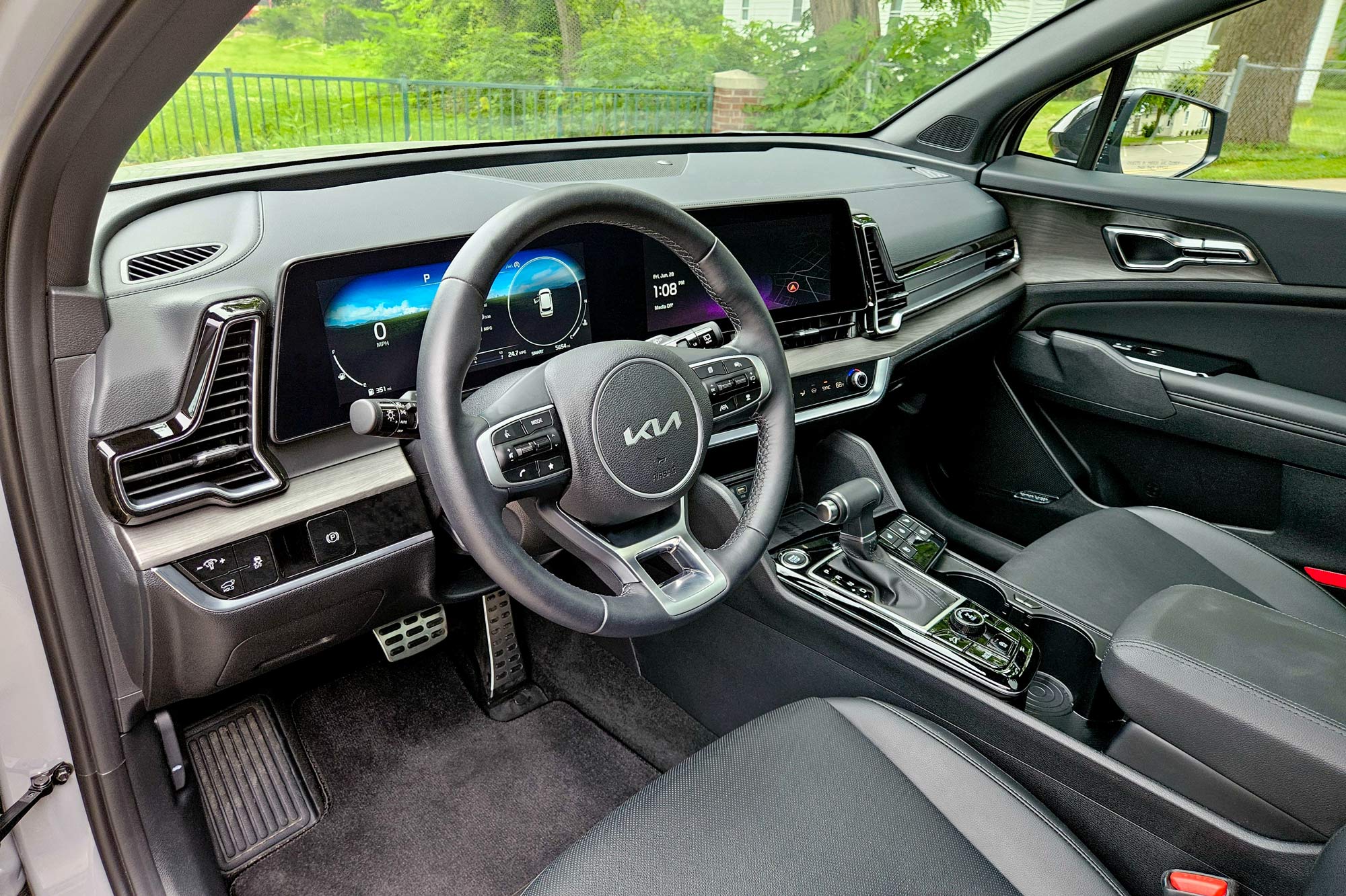 2024 Kia Sportage X-Pro Prestige interior showing the dashboard and center console