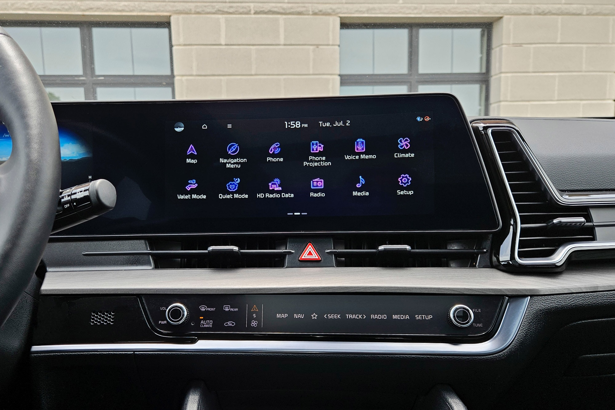 2024 Kia Sportage X-Pro Prestige interior showing the infotainment system