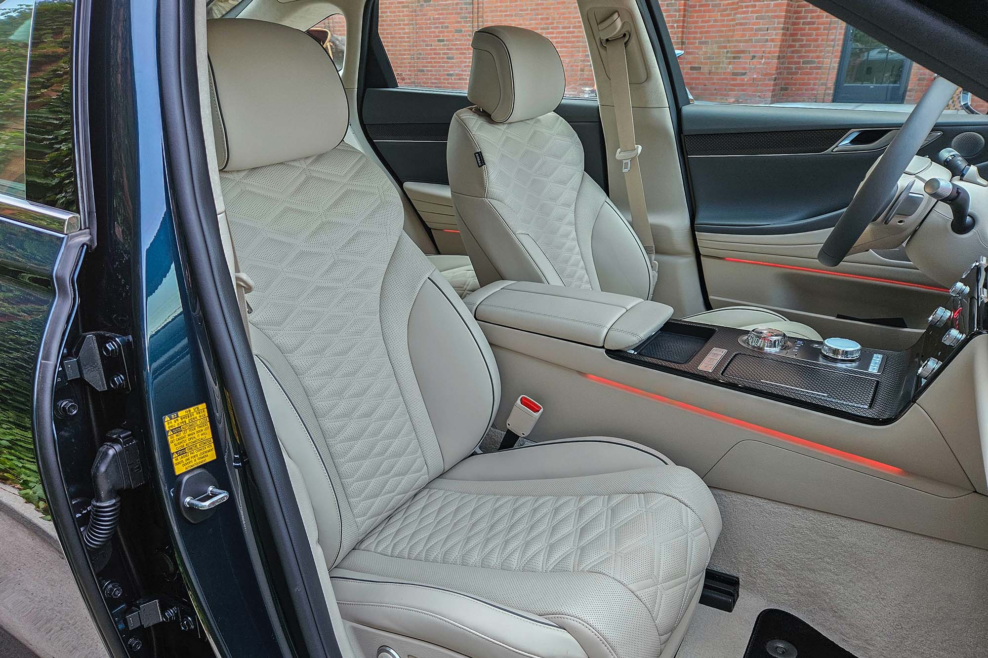 2025 Genesis G80 3.5T Sport Prestige interior showing the front seats