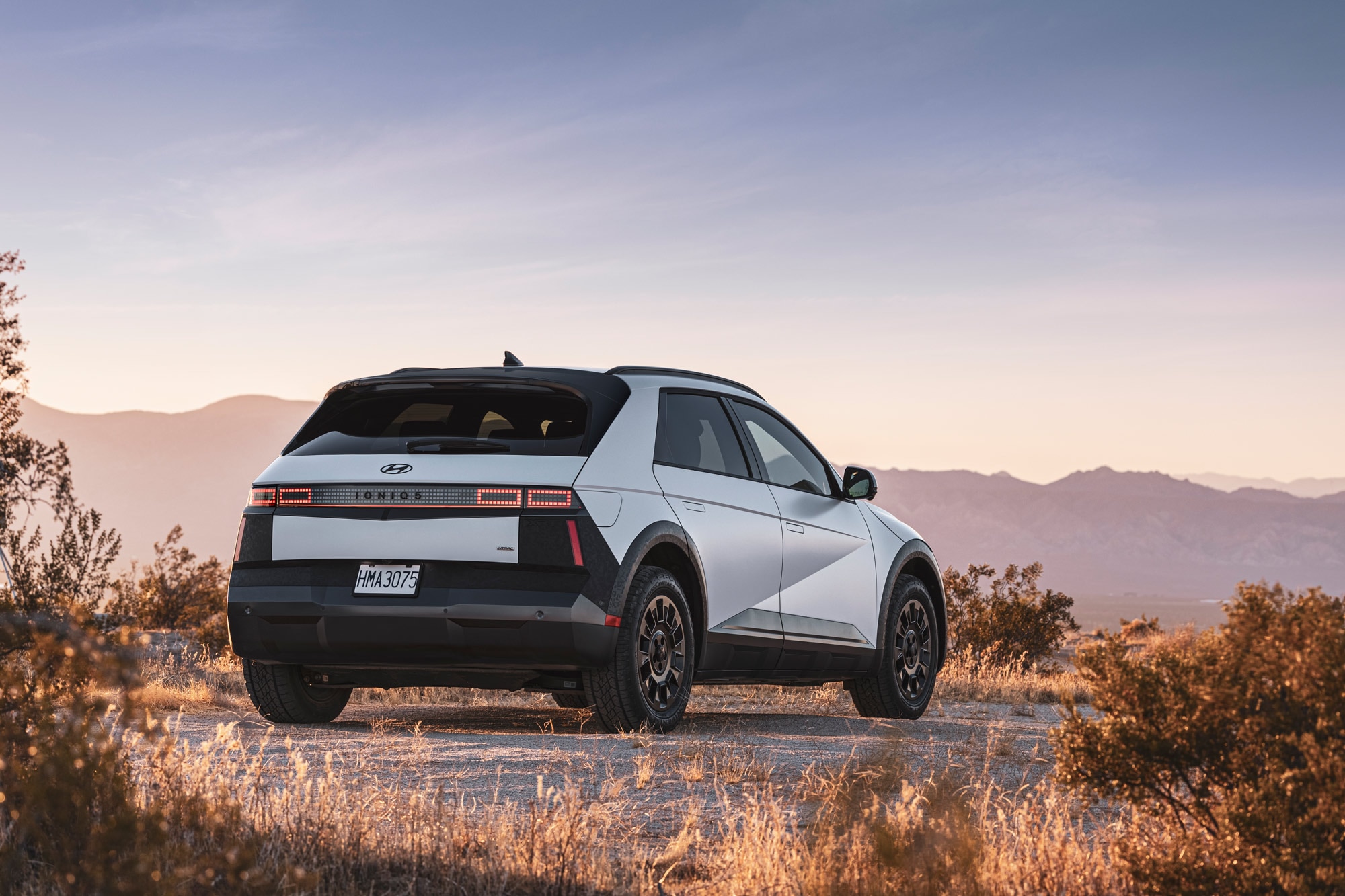 2025 Hyundai Ioniq 5 parked off-road in desert.