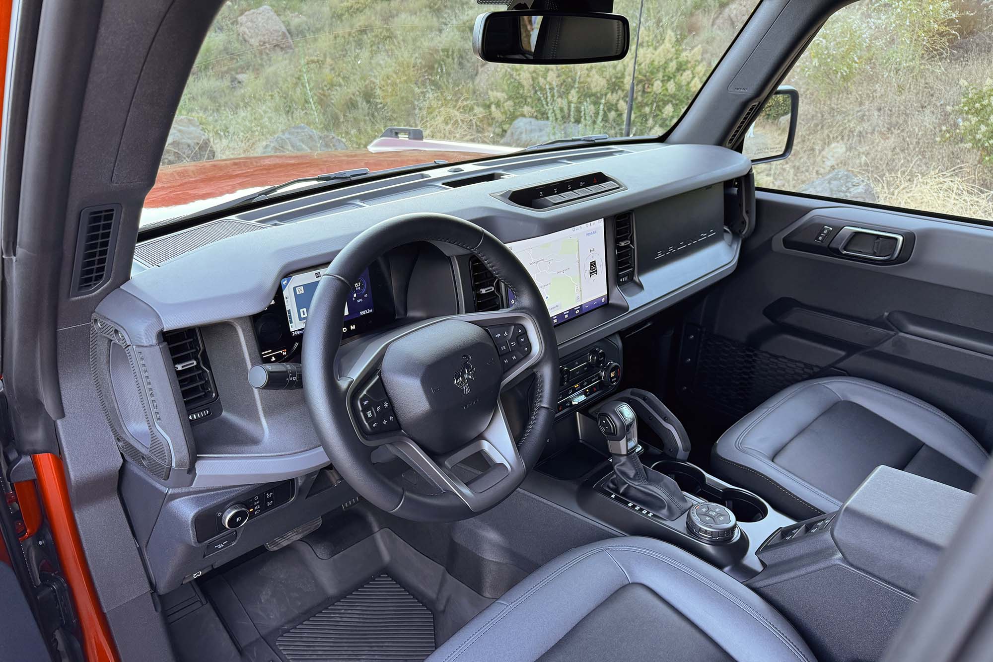 The front seats and dashboard of a 2024 Ford Bronco Big Bend four-door