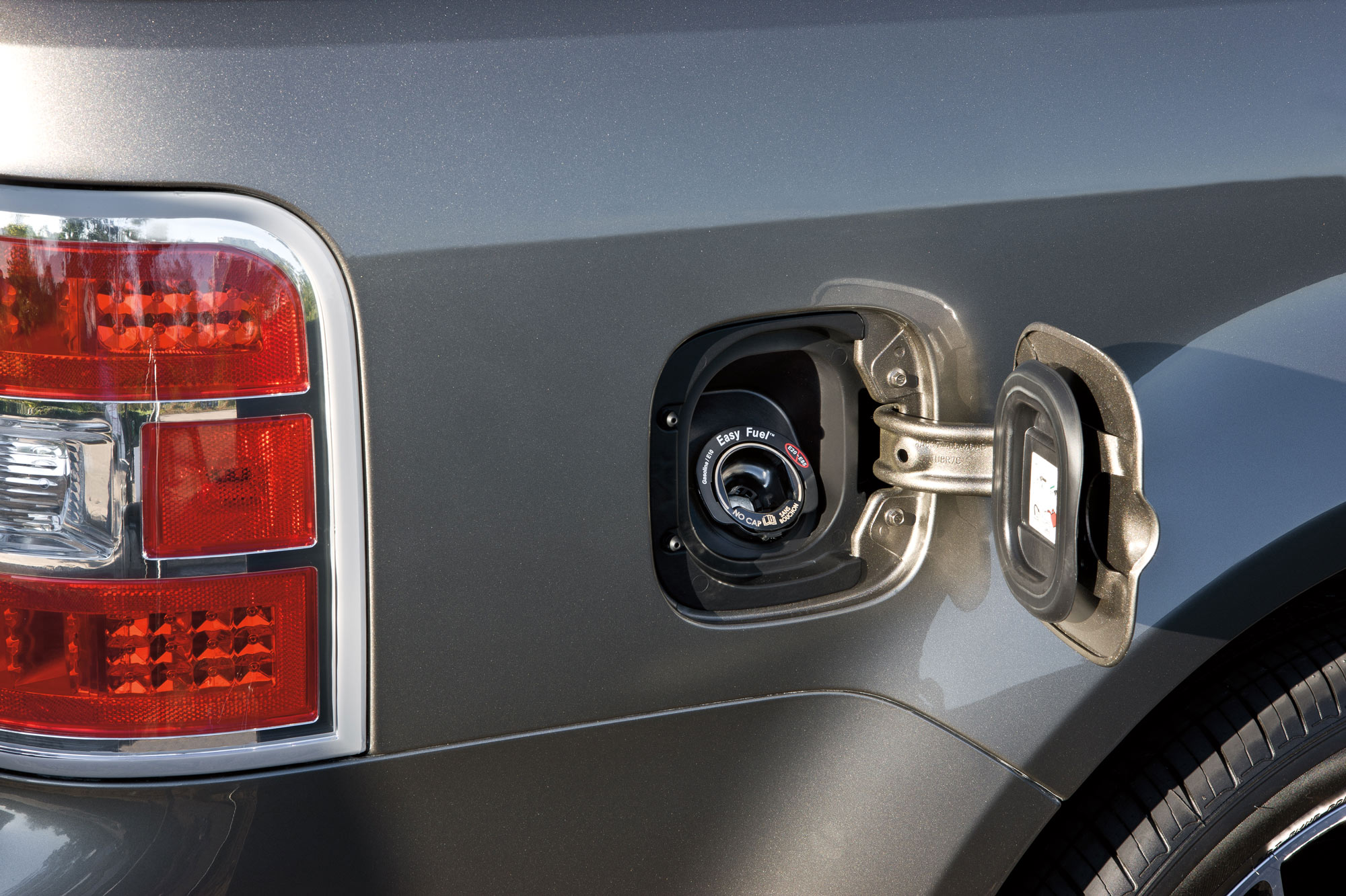 Capless fuel filler on a gray Ford Flex