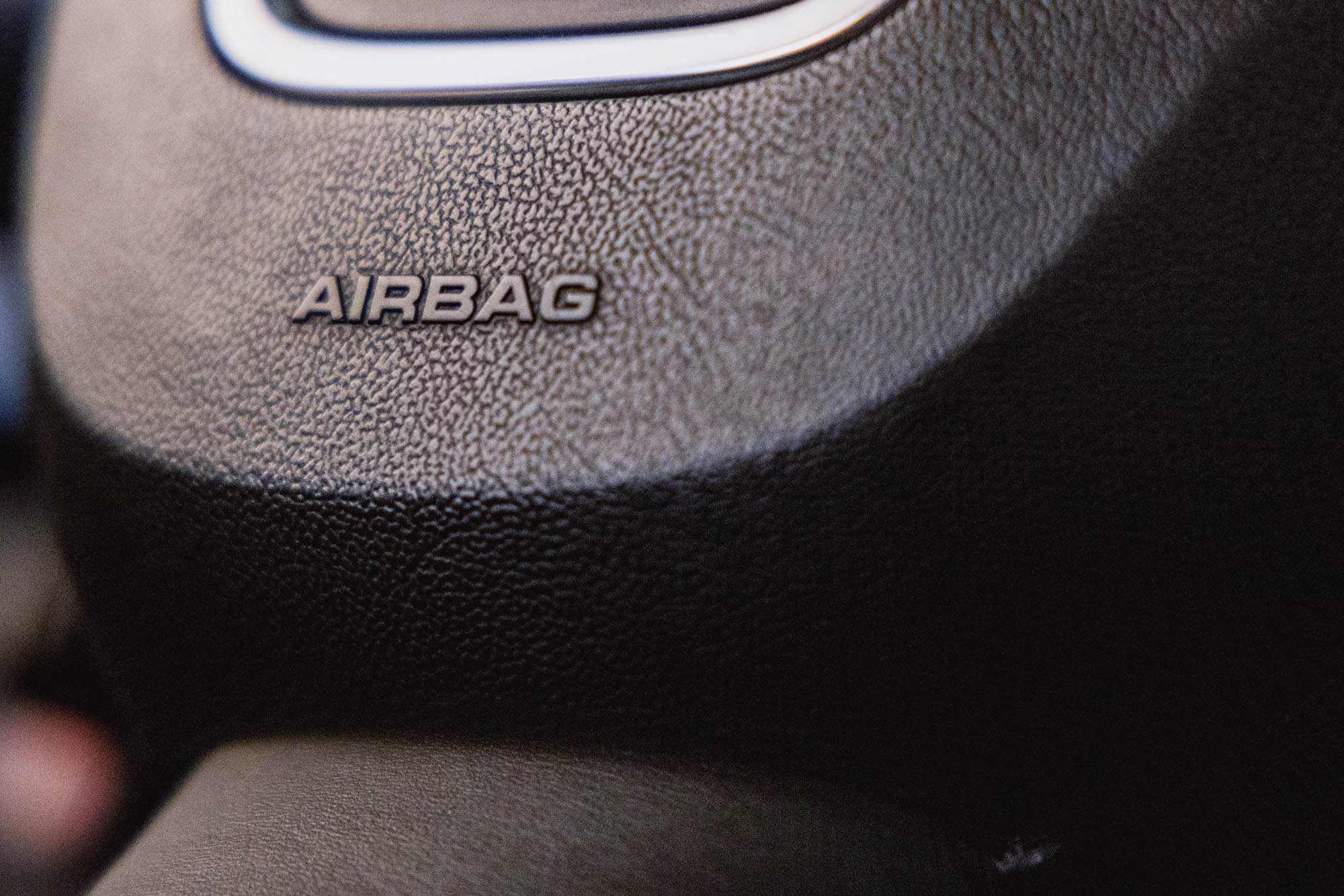 Steering wheel hub with the word airbag visible.