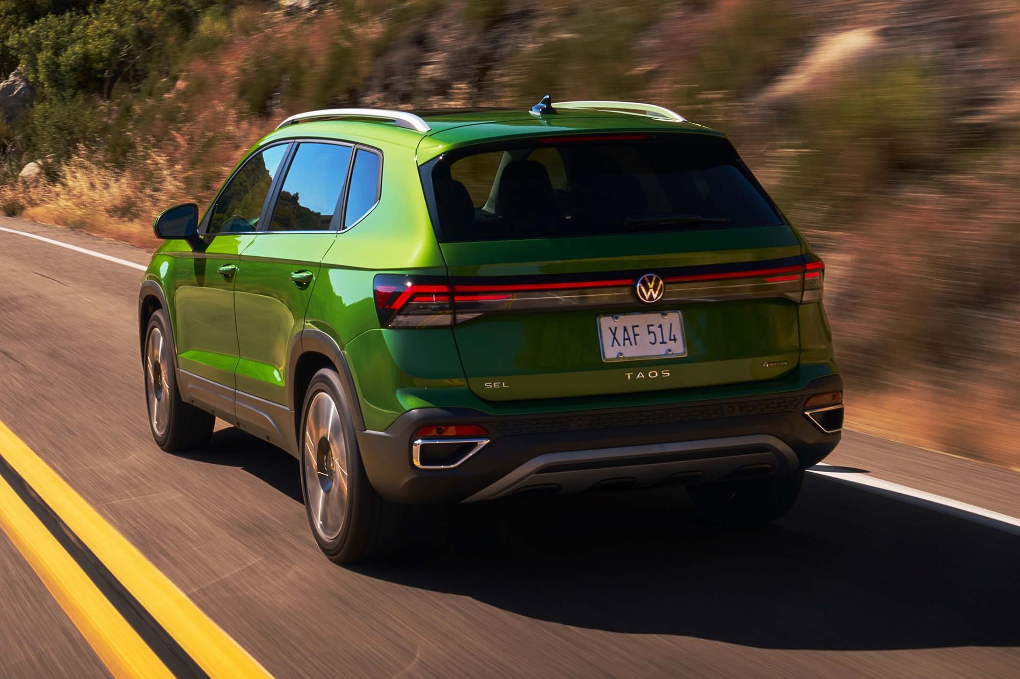 A left-rear view of a 2025 Volkswagen Taos on a highway