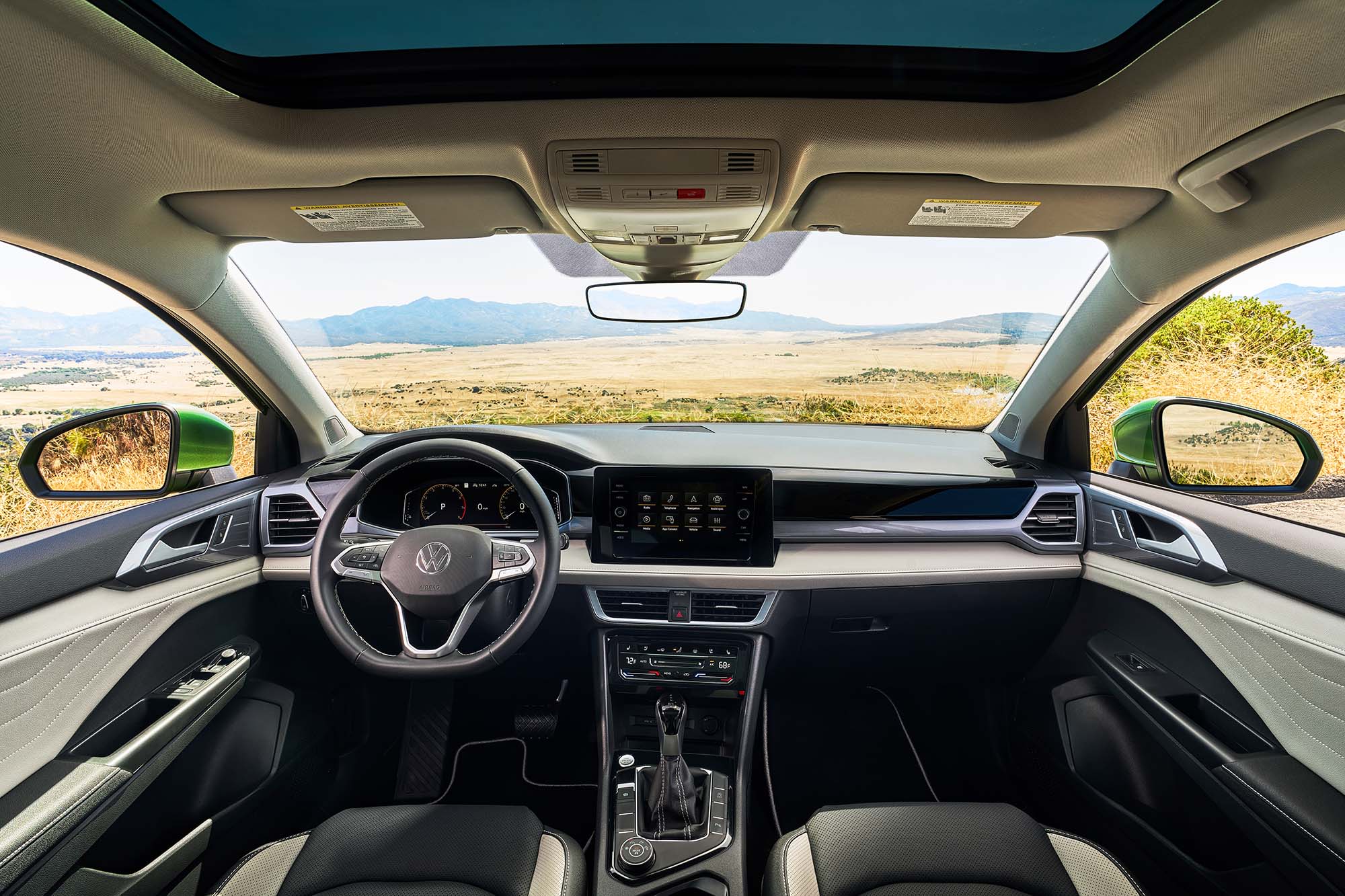 The front seats and dashboard of the 2025 Volkswagen Taos