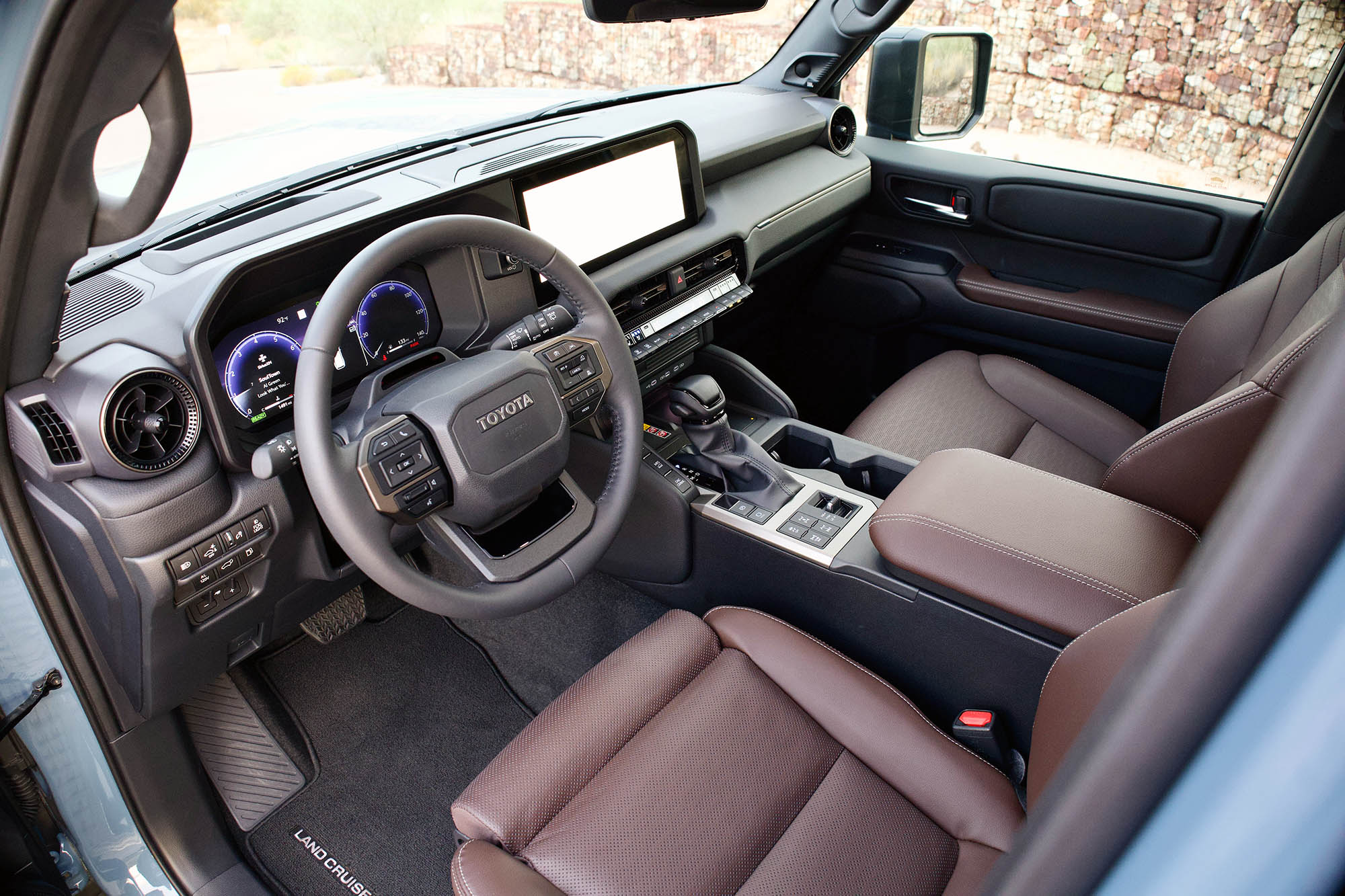 Interior front of Toyota Land Cruiser with Java leather upholstery.