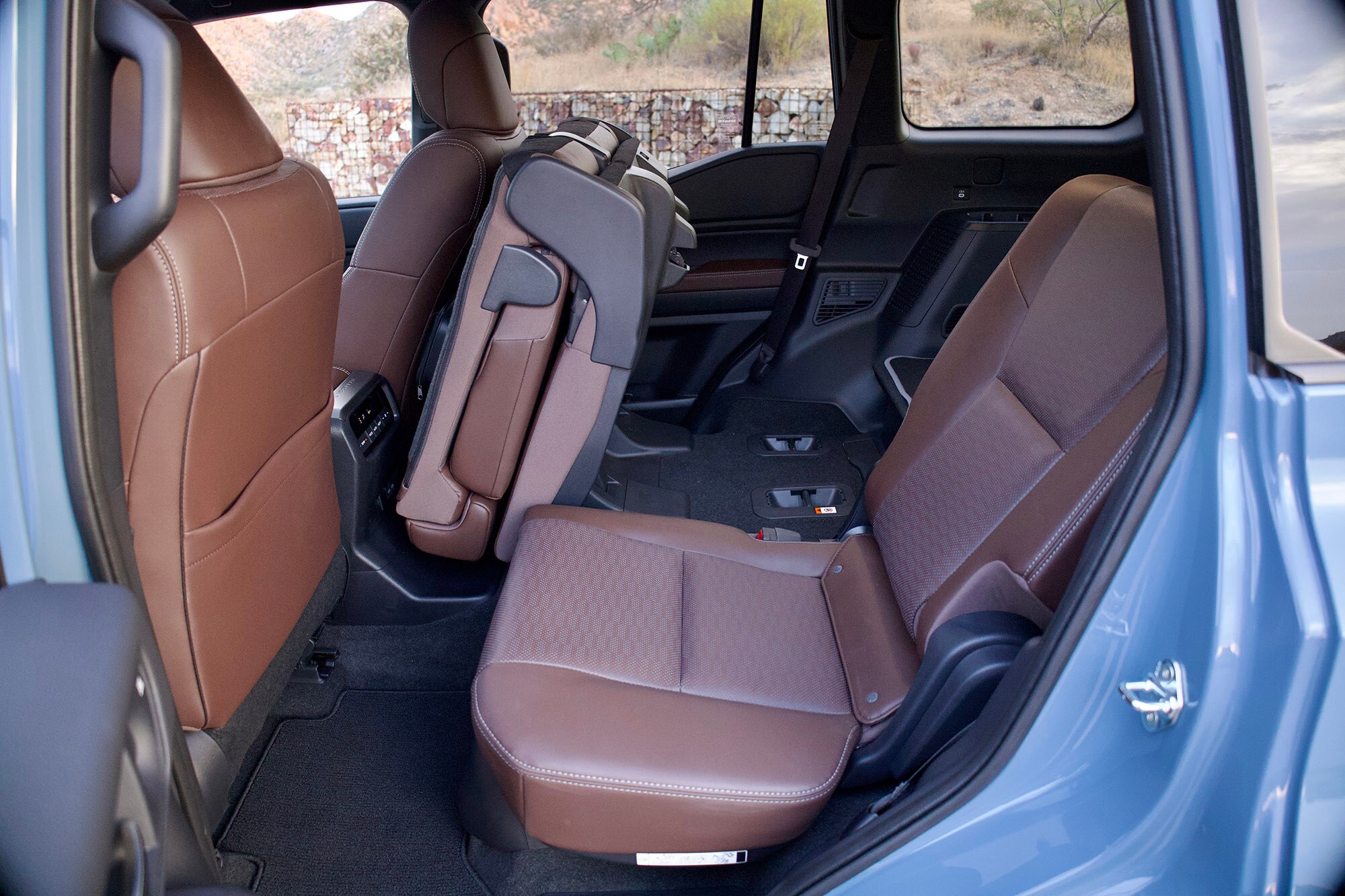 Rear seat of a Toyota Land Cruiser with Java leather upholstery.