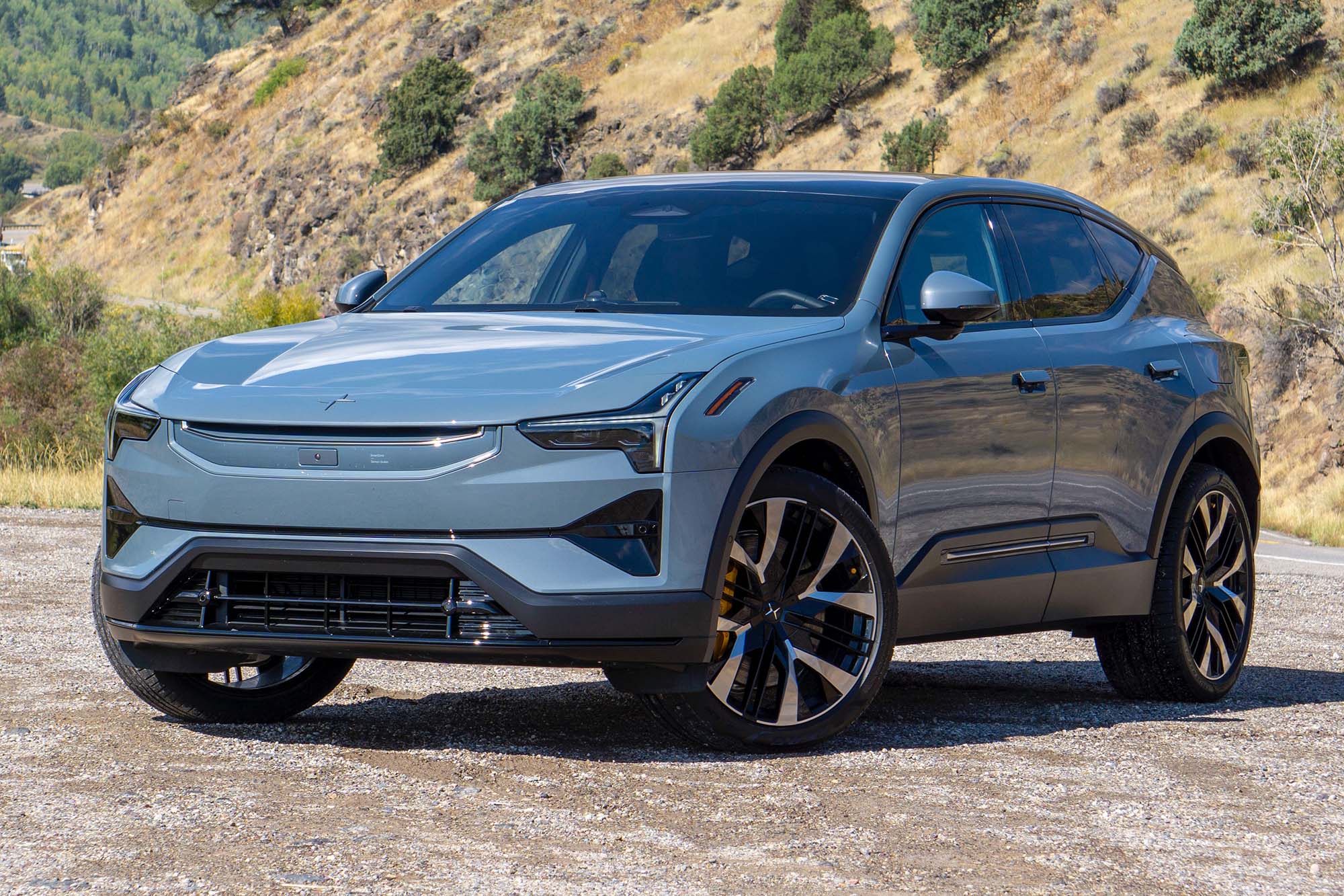 Gray 2025 Polestar 3 Launch Edition with mountains in the background.