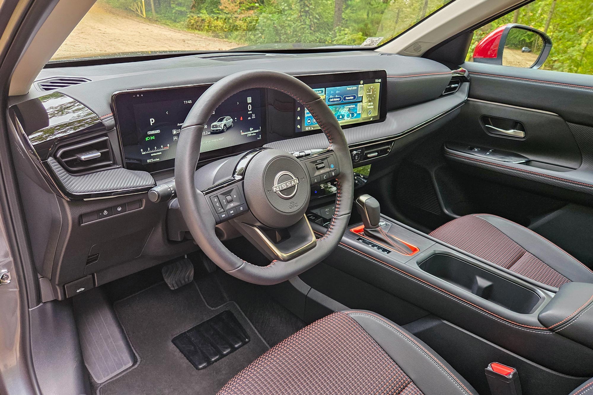 2025 Nissan Kicks SR's dashboard and front seats