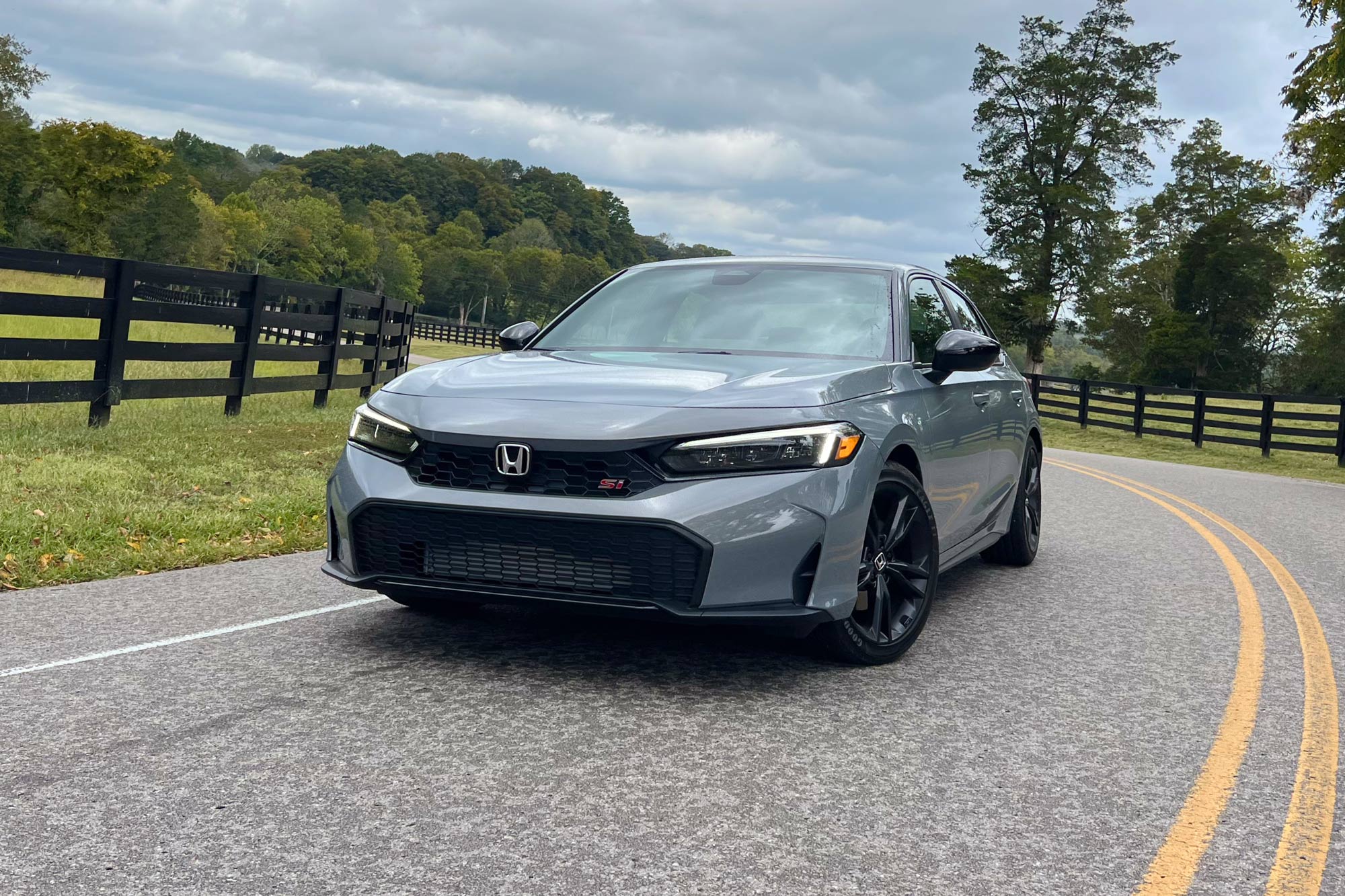 2025 Honda Civic Si parked on country road.