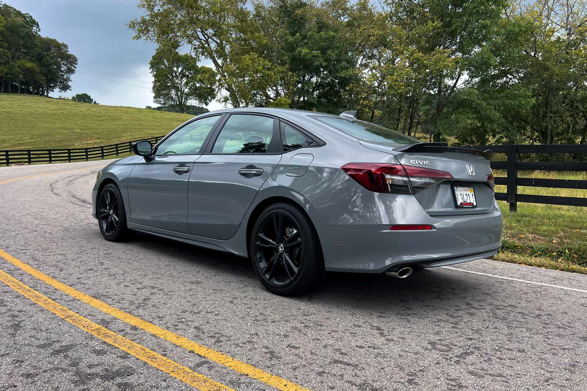 2025 Honda Civic Si parked on country road.