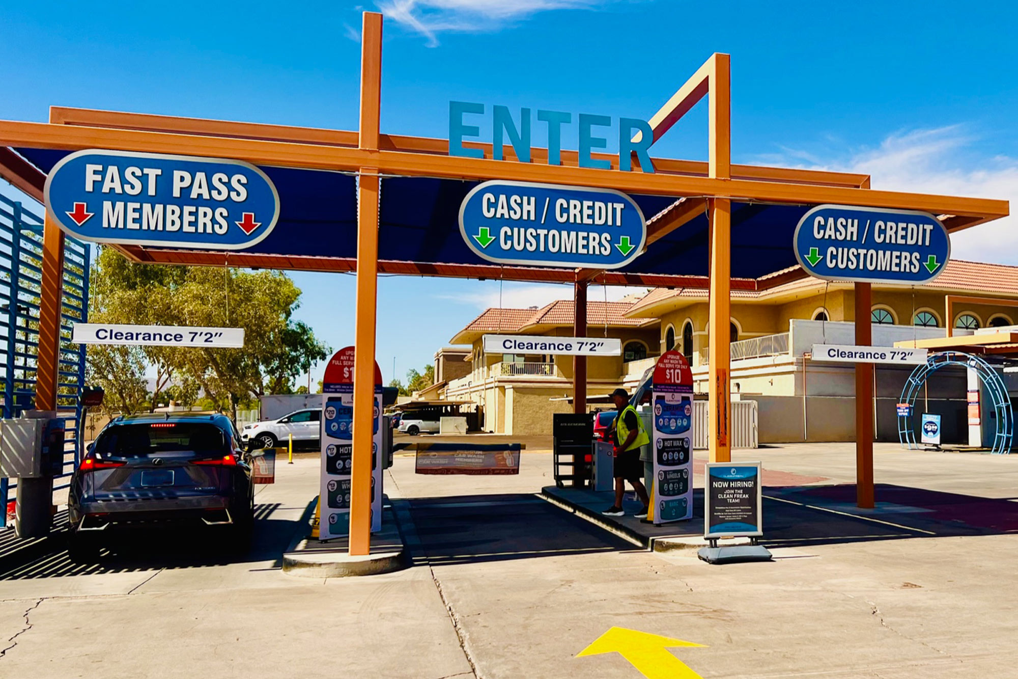 Entrance to an automated car wash with member entrance and cash/credit entrances