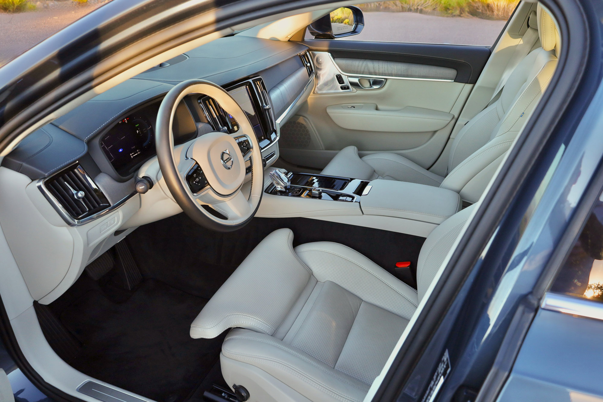 A 2024 Volvo S90 T8 Recharge's dashboard, center console, and front seats