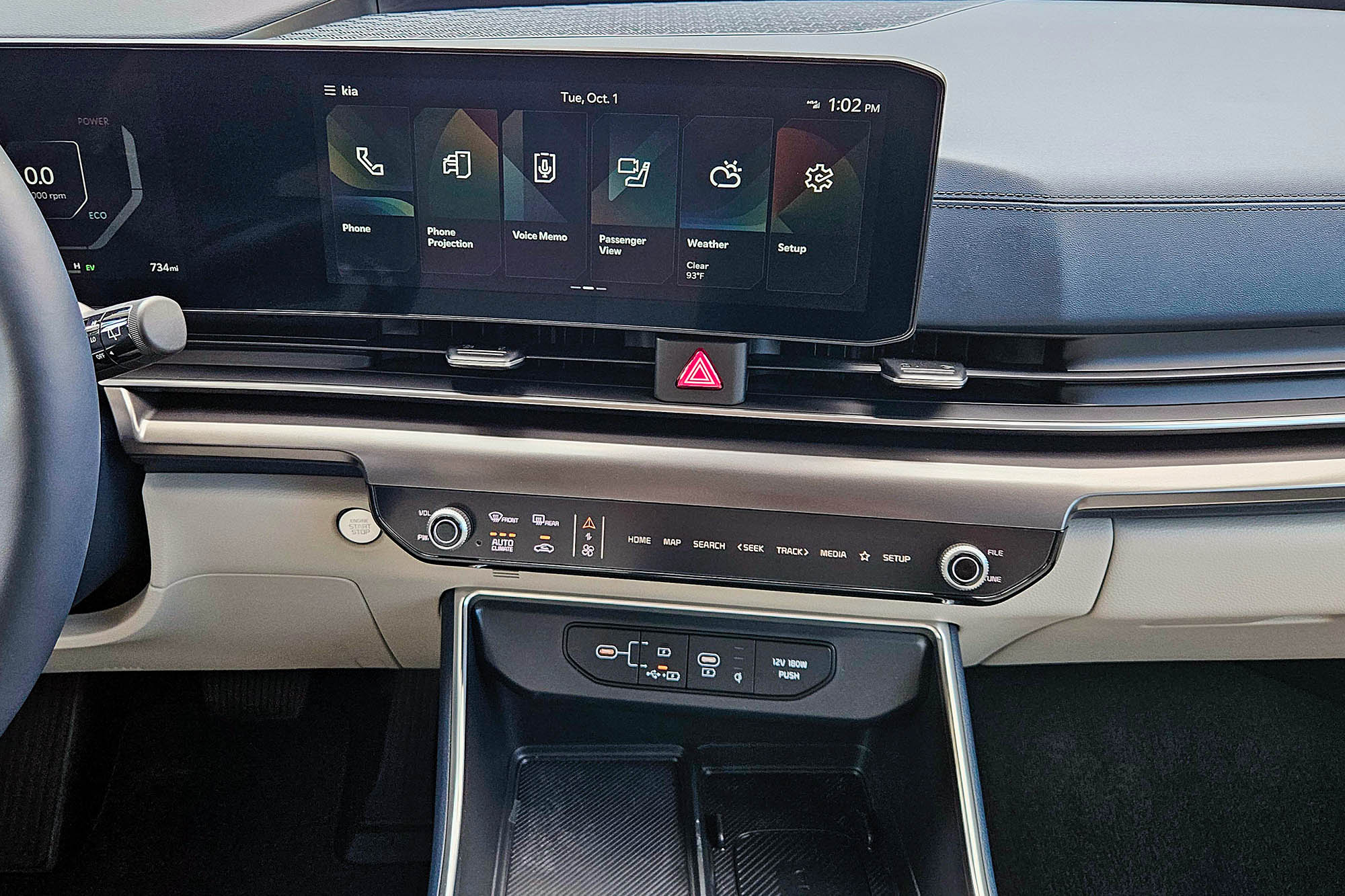 2025 Kia Carnival Hybrid SX Prestige interior showing the infotainment system and dual-function controls.