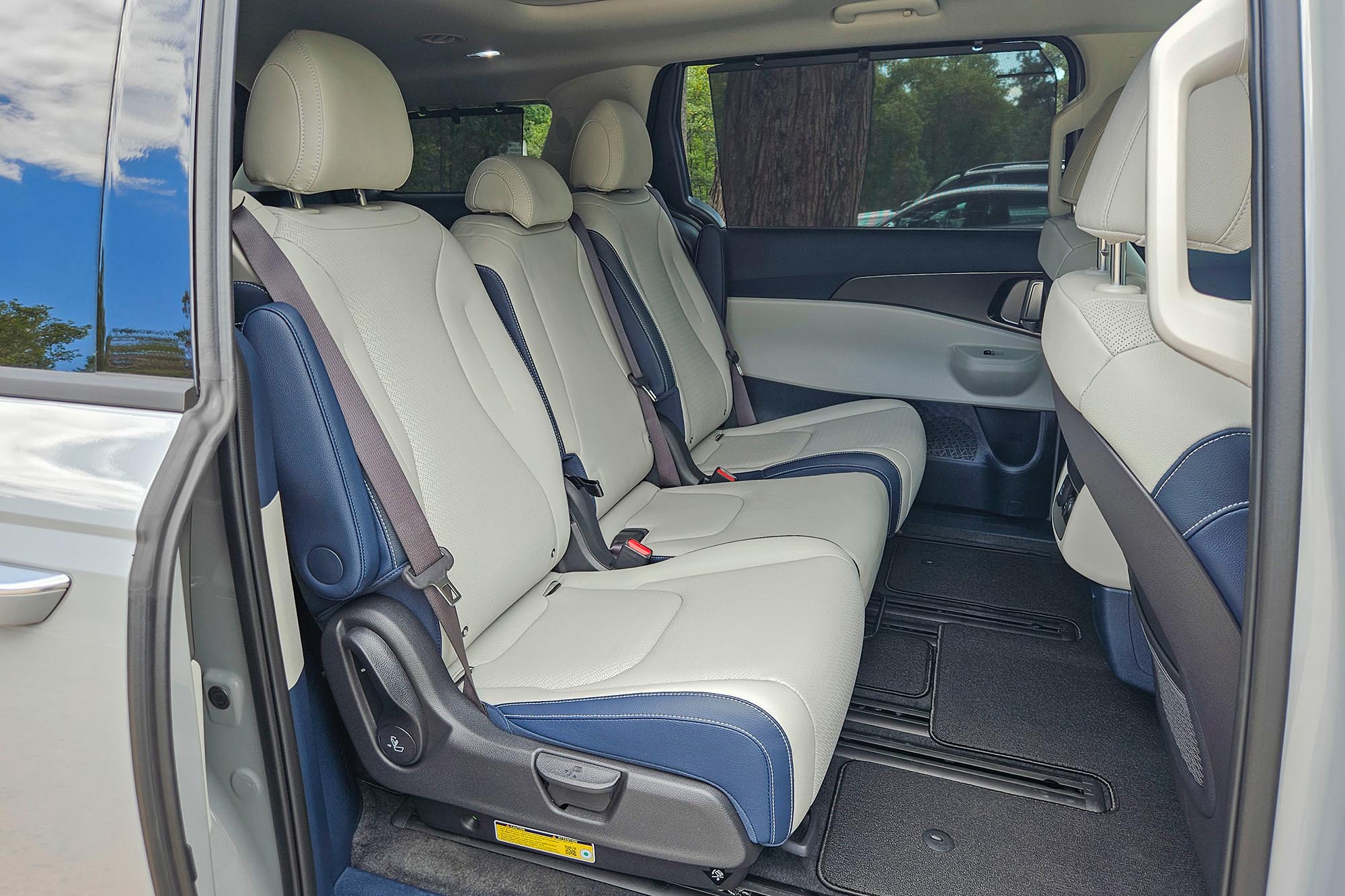 2025 Kia Carnival Hybrid SX Prestige interior showing the second-row seats.