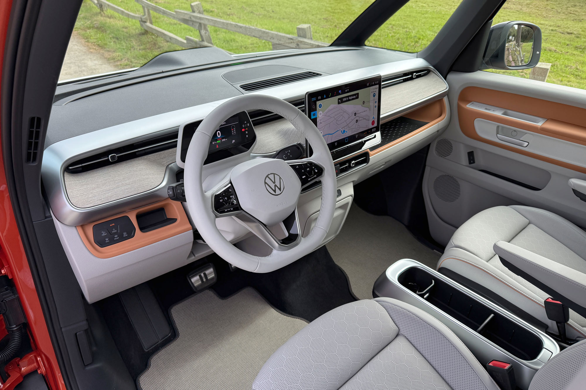 2025 Volkswagen ID. Buzz Pro S Plus interior in Dune showing the dashboard, front seats, and Buzz Box console.