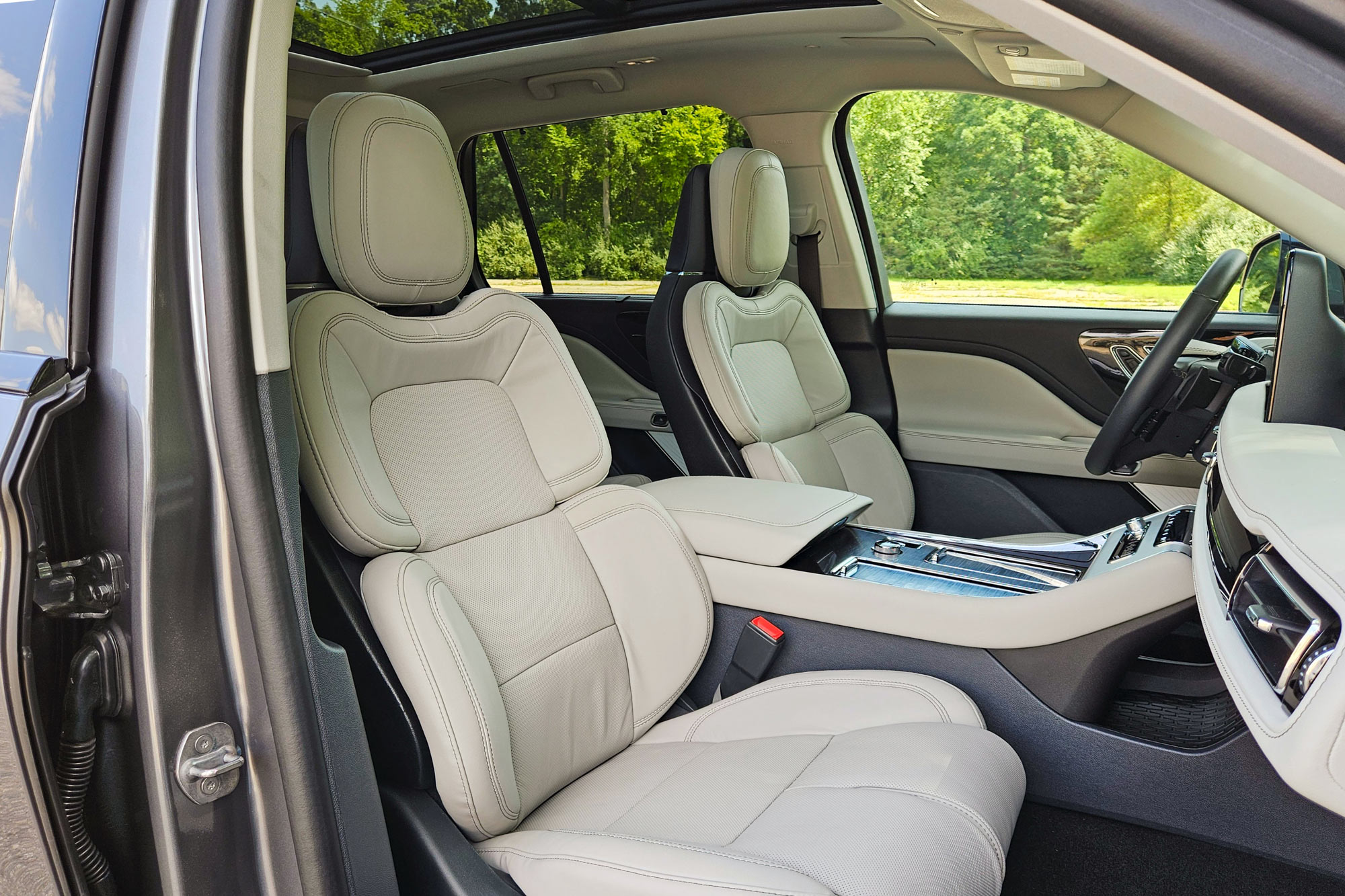 Cream 2025 Lincoln Aviator Reserve interior showing the 30-way Perfect Position front seats