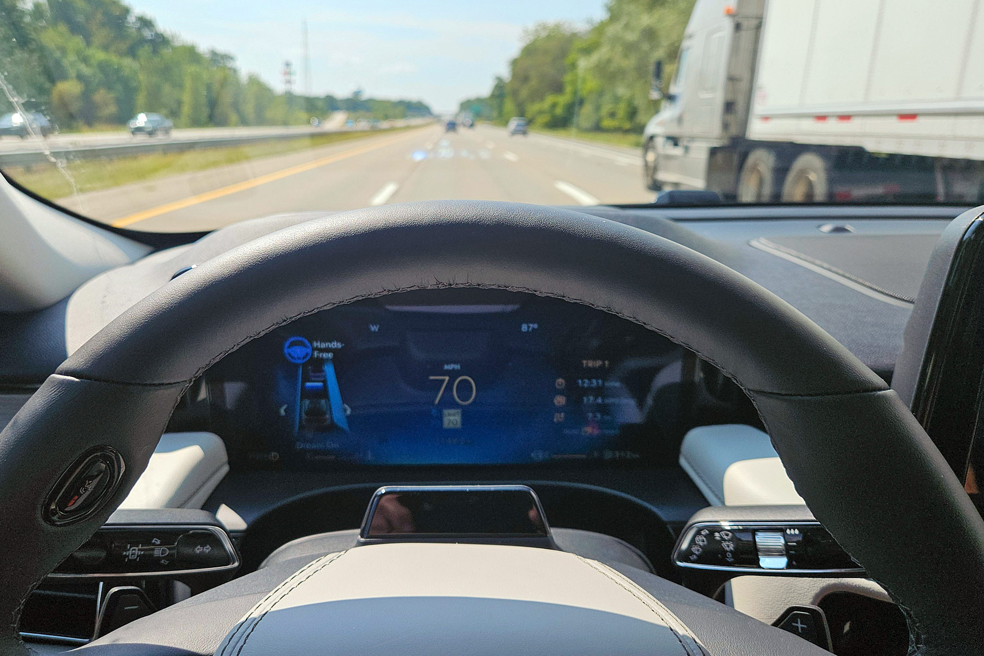 2025 Lincoln Aviator interior showing BlueCruise hands-free driving active on a freeway